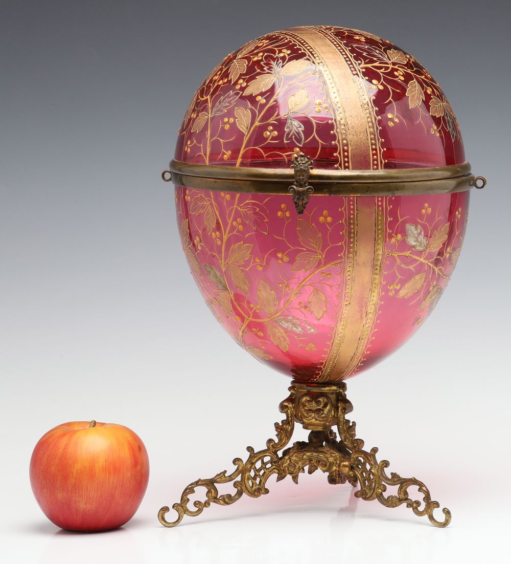 A MOSER GILT AND ENAMELED CRANBERRY GLASS TANTALUS