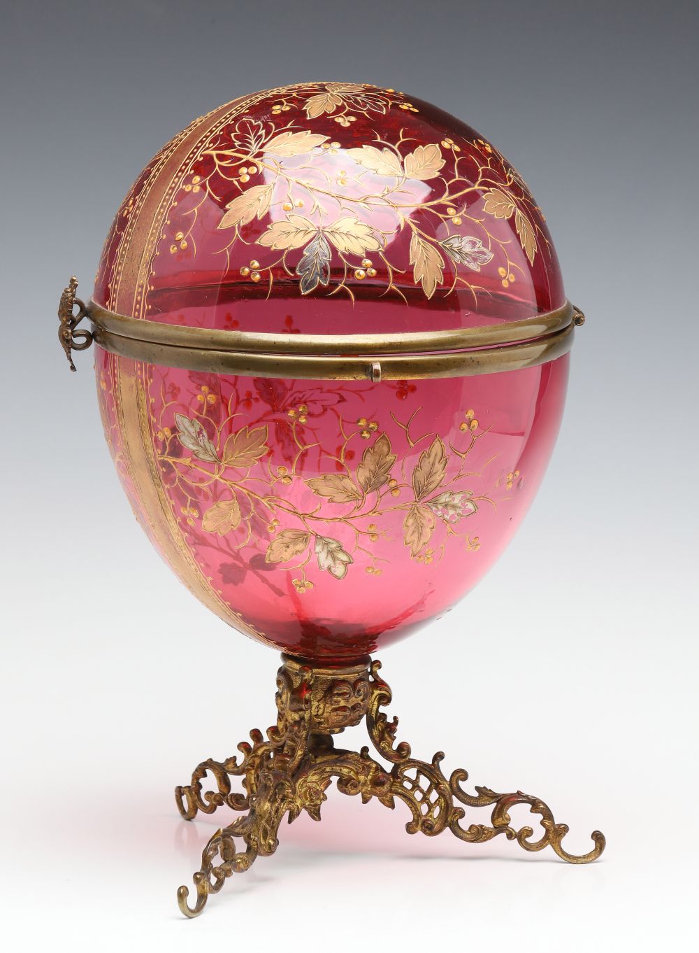 A MOSER GILT AND ENAMELED CRANBERRY GLASS TANTALUS