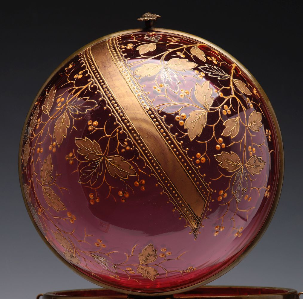 A MOSER GILT AND ENAMELED CRANBERRY GLASS TANTALUS