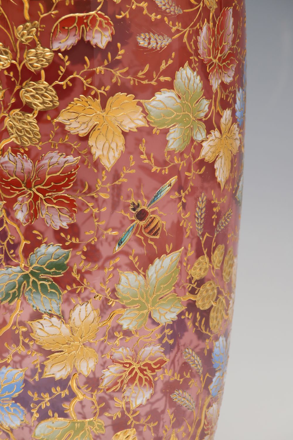 A MOSER 15-INCH GILT AND ENAMEL VASE WITH INSECTS