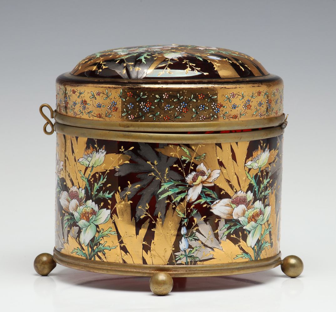 A MOSER DEEP RUBY BOX WITH GILT AND ENAMEL DECORATION