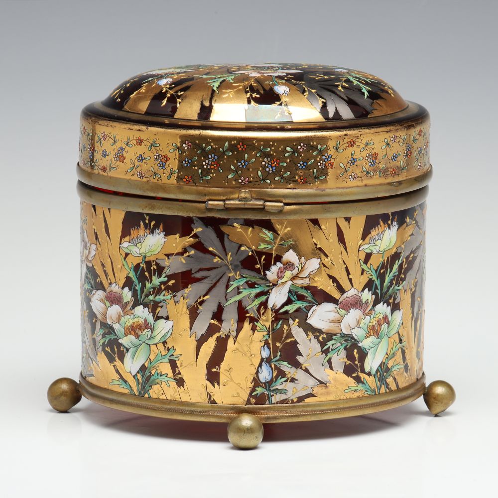 A MOSER DEEP RUBY BOX WITH GILT AND ENAMEL DECORATION