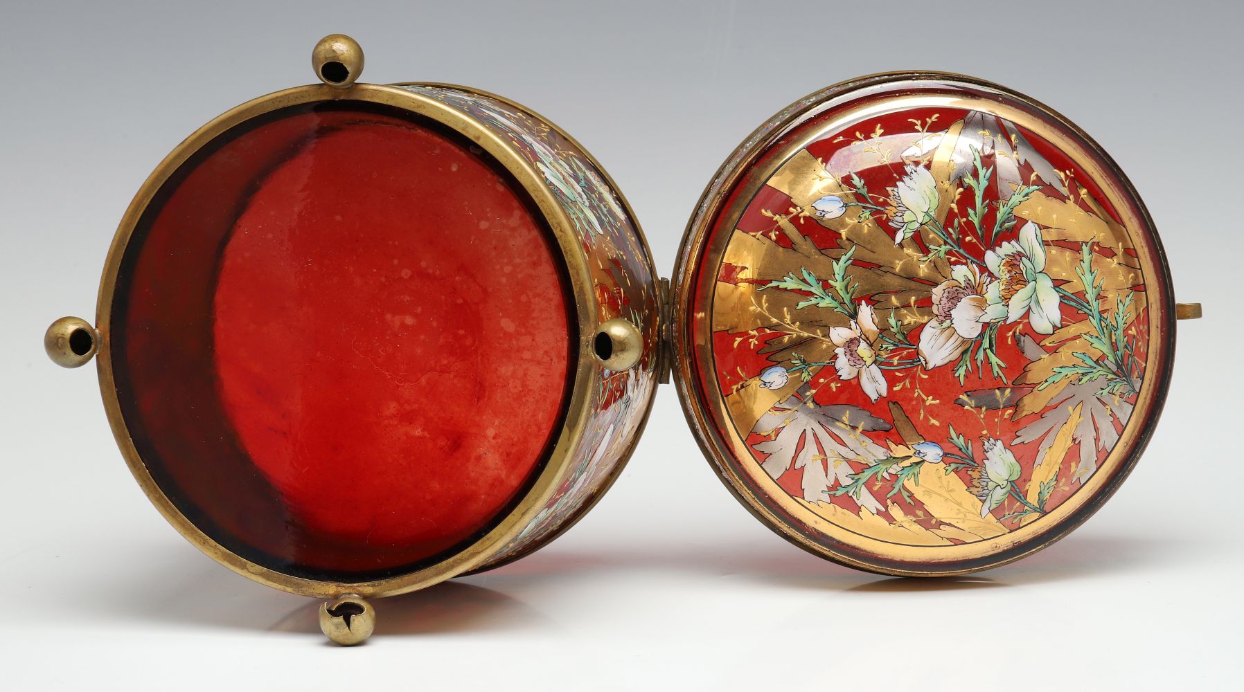 A MOSER DEEP RUBY BOX WITH GILT AND ENAMEL DECORATION