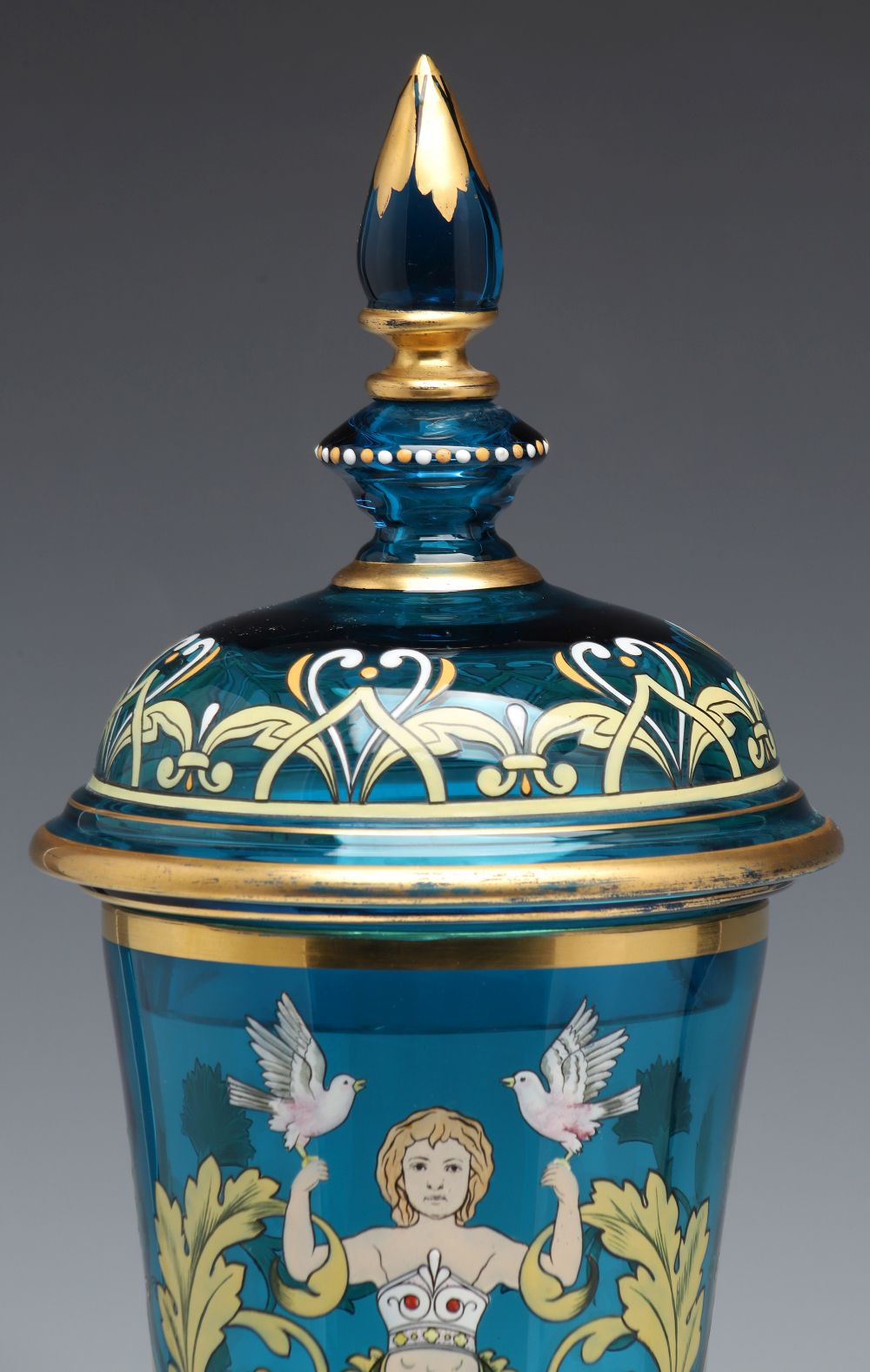 A MOSER BLUE ART GLASS DECORATED POKAL WITH COVER