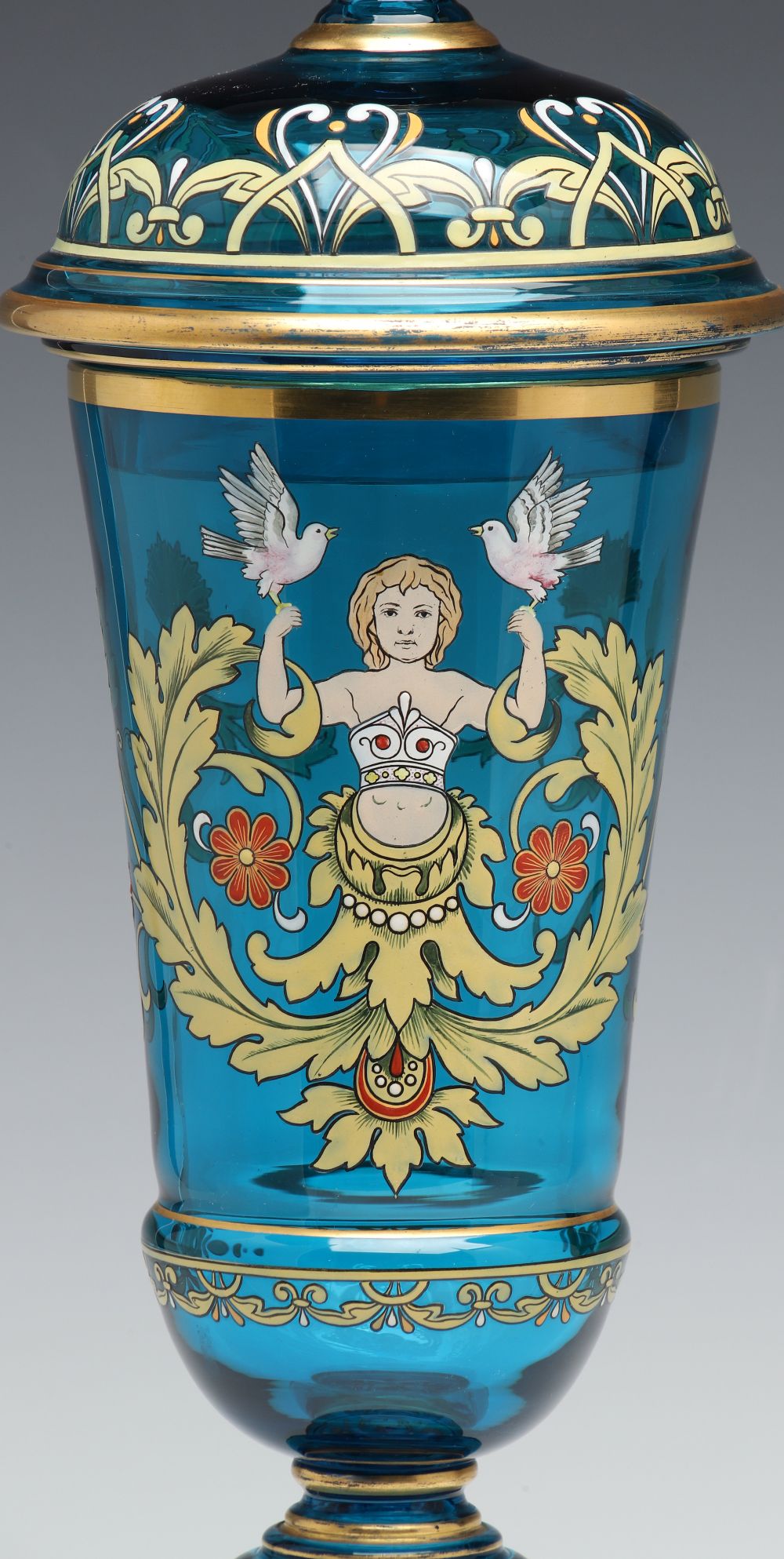 A MOSER BLUE ART GLASS DECORATED POKAL WITH COVER