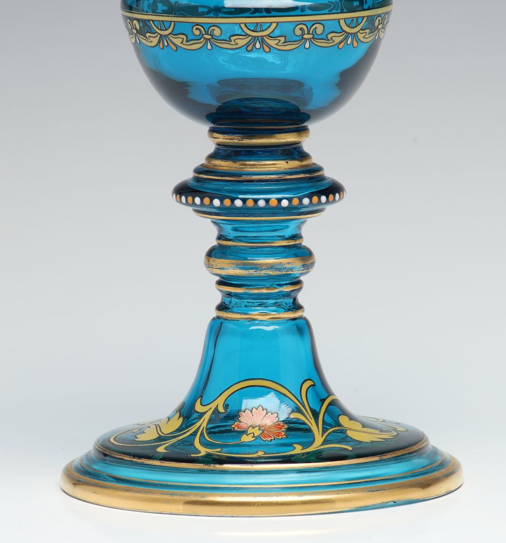 A MOSER BLUE ART GLASS DECORATED POKAL WITH COVER