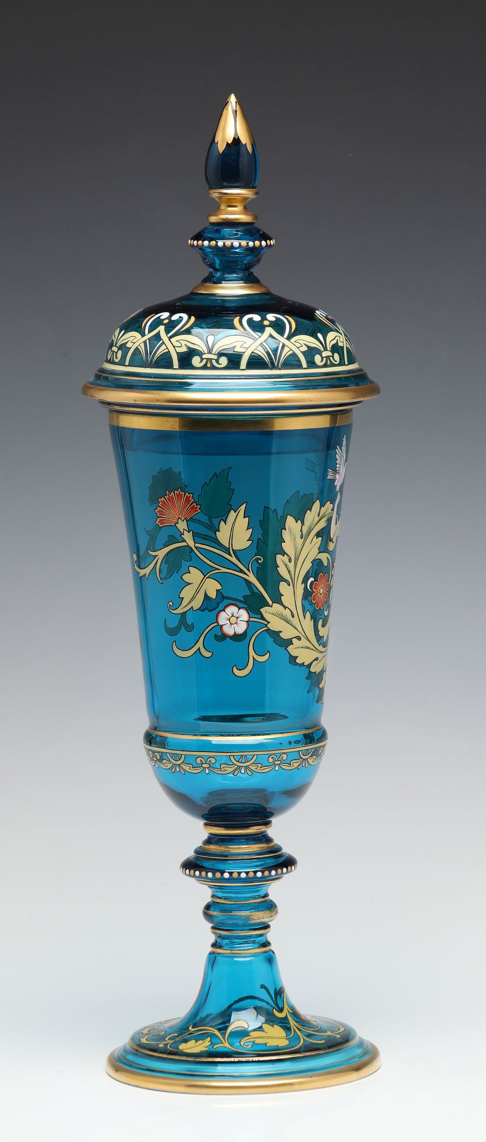 A MOSER BLUE ART GLASS DECORATED POKAL WITH COVER