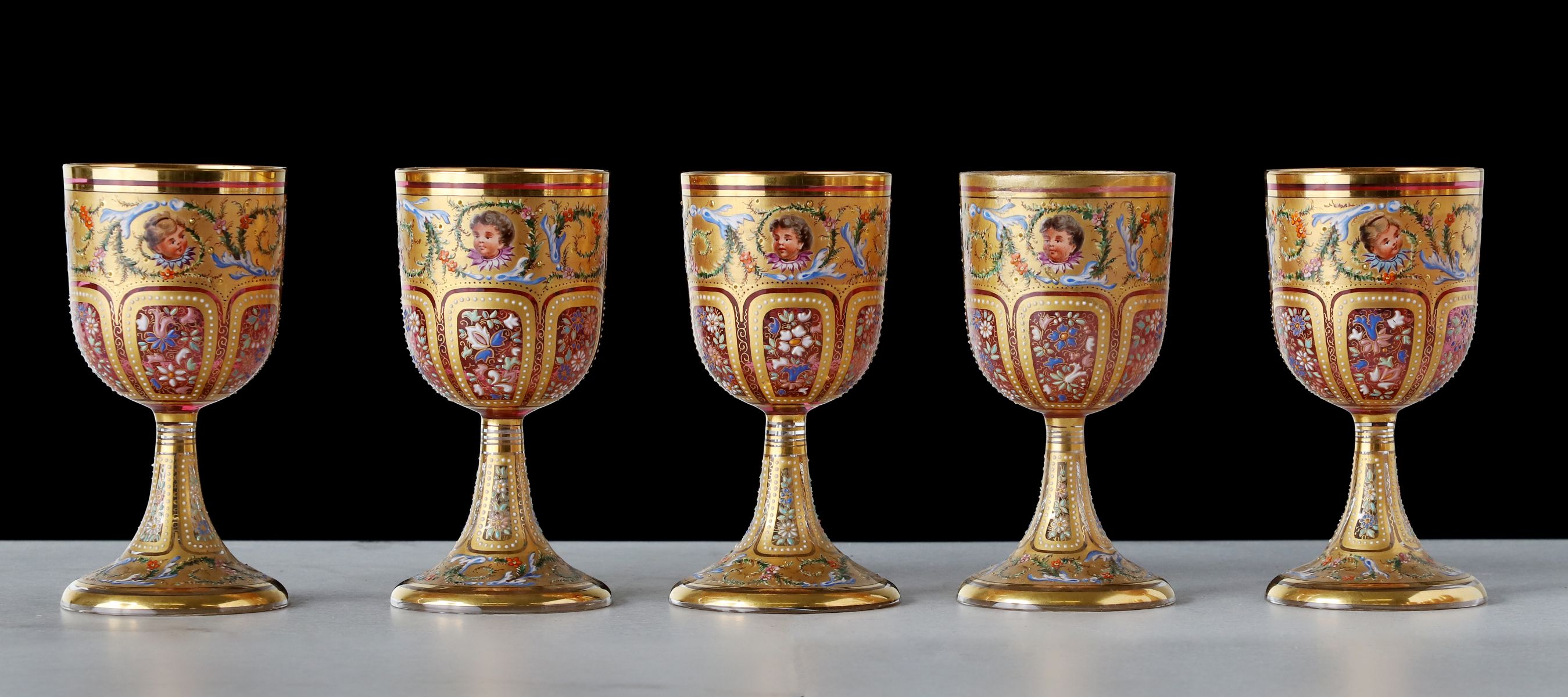 TWELVE OUTSTANDING MOSER GILT AND ENAMELED GOBLETS