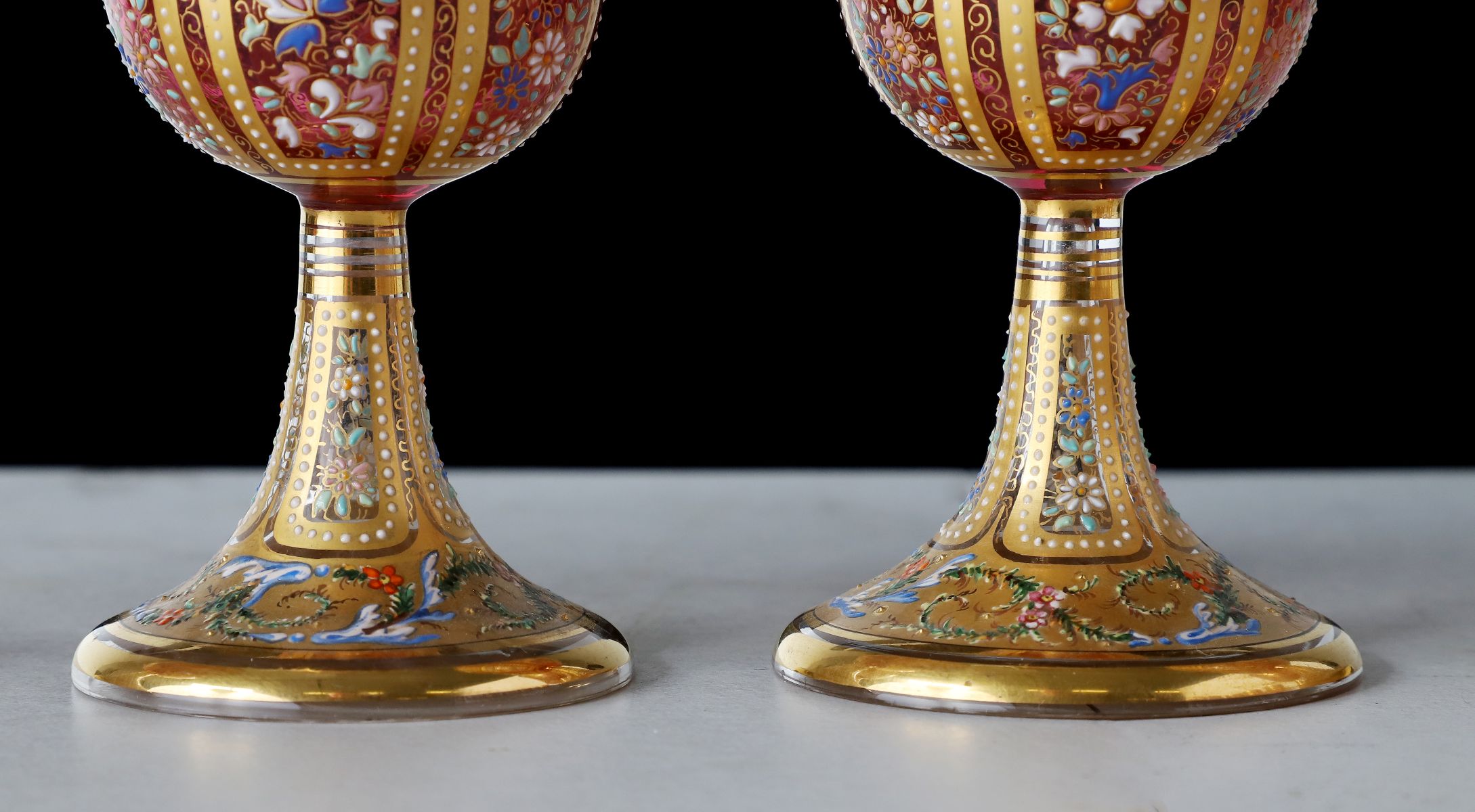 TWELVE OUTSTANDING MOSER GILT AND ENAMELED GOBLETS