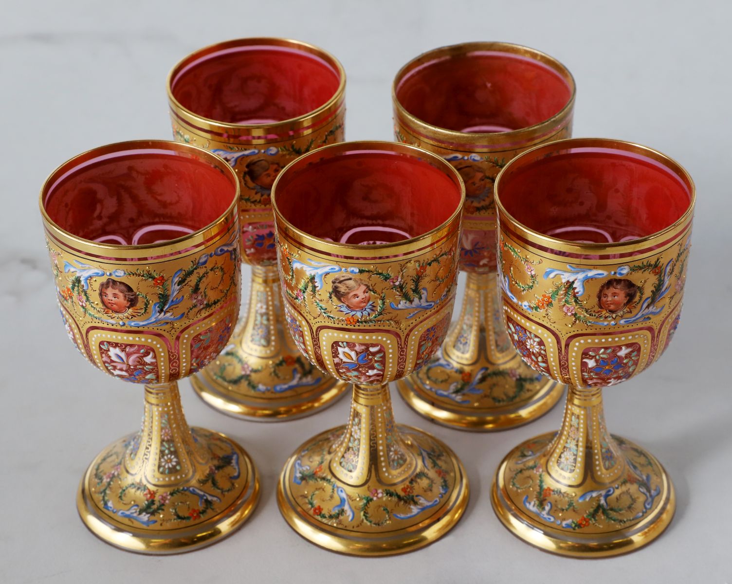 TWELVE OUTSTANDING MOSER GILT AND ENAMELED GOBLETS