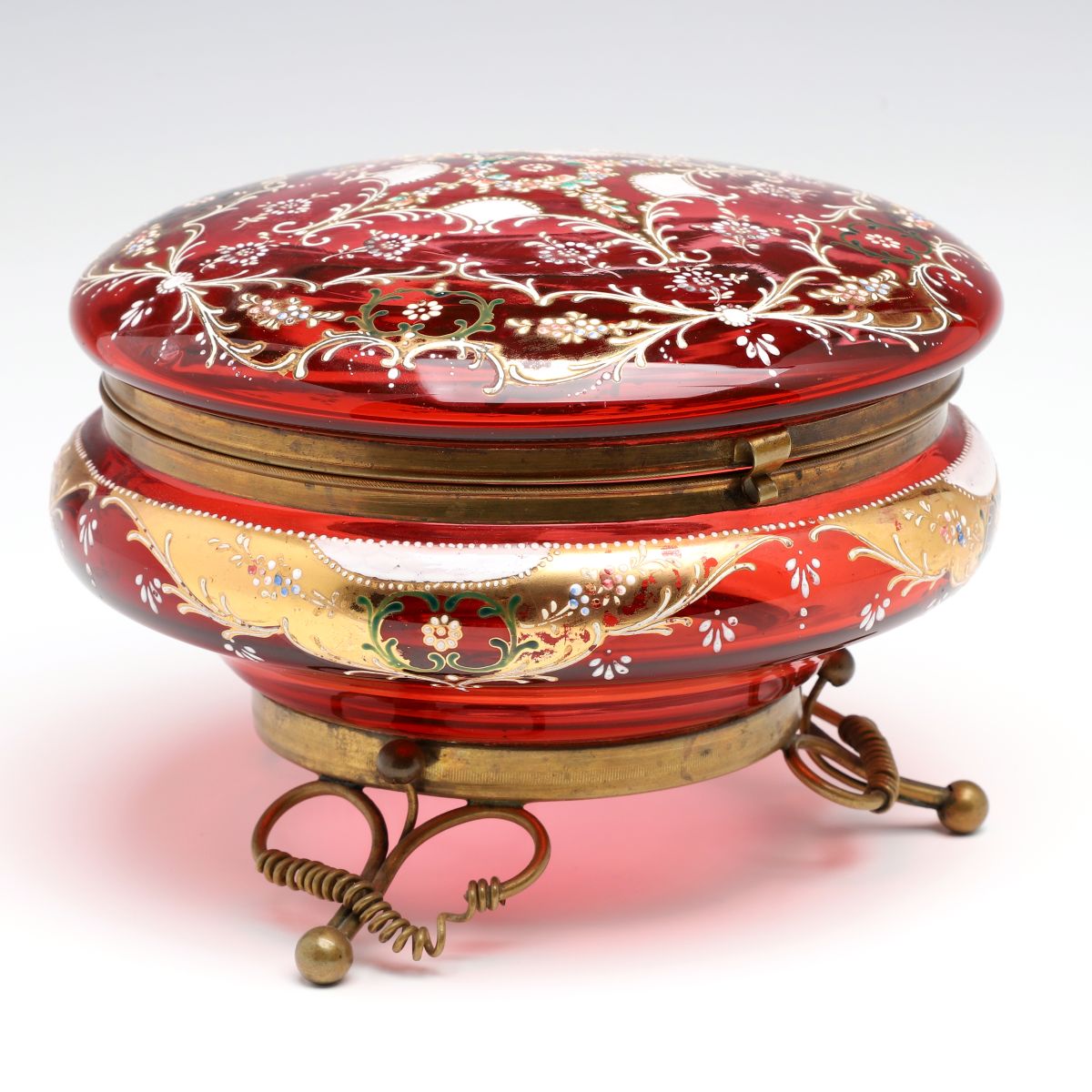 A MOSER GILT AND ENAMEL DECORATED CRANBERRY GLASS BOX