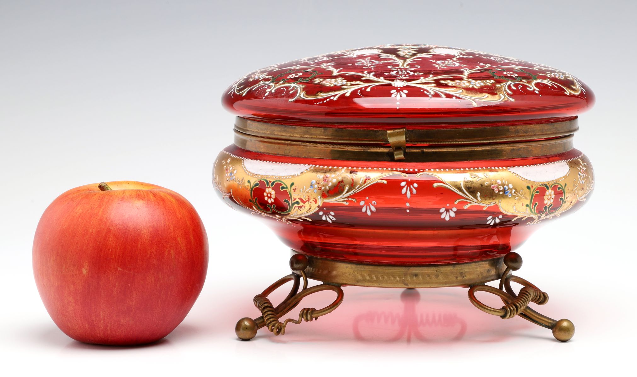 A MOSER GILT AND ENAMEL DECORATED CRANBERRY GLASS BOX