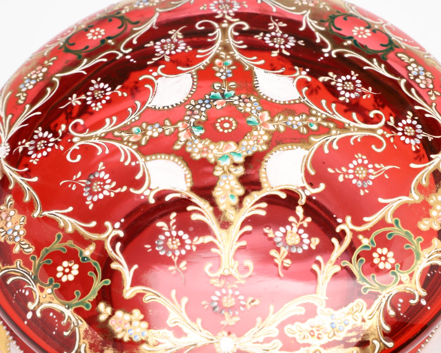 A MOSER GILT AND ENAMEL DECORATED CRANBERRY GLASS BOX