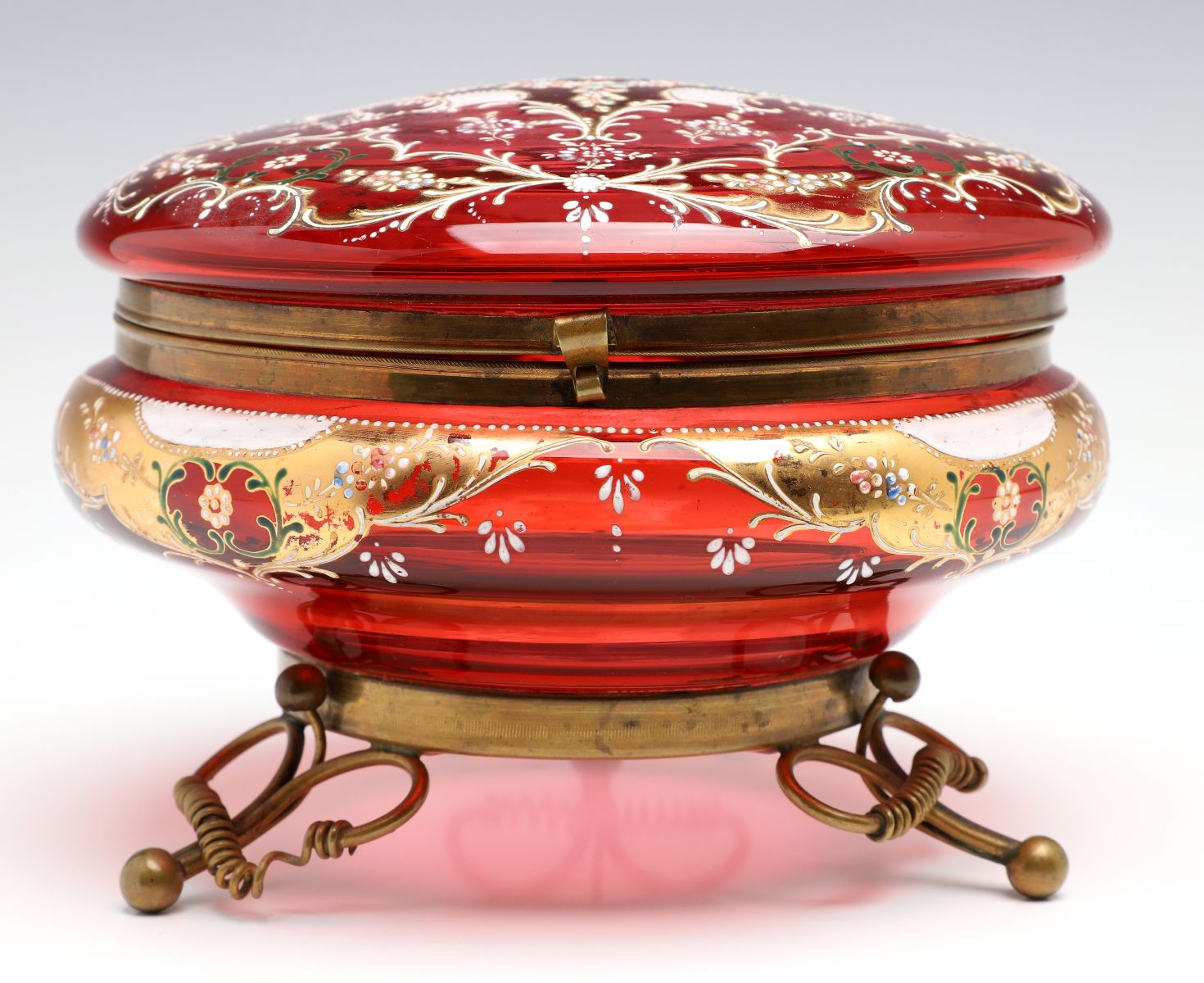 A MOSER GILT AND ENAMEL DECORATED CRANBERRY GLASS BOX