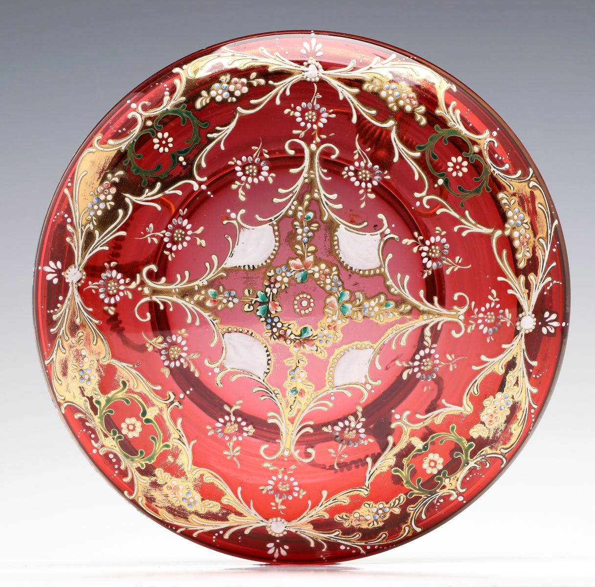 A MOSER GILT AND ENAMEL DECORATED CRANBERRY GLASS BOX