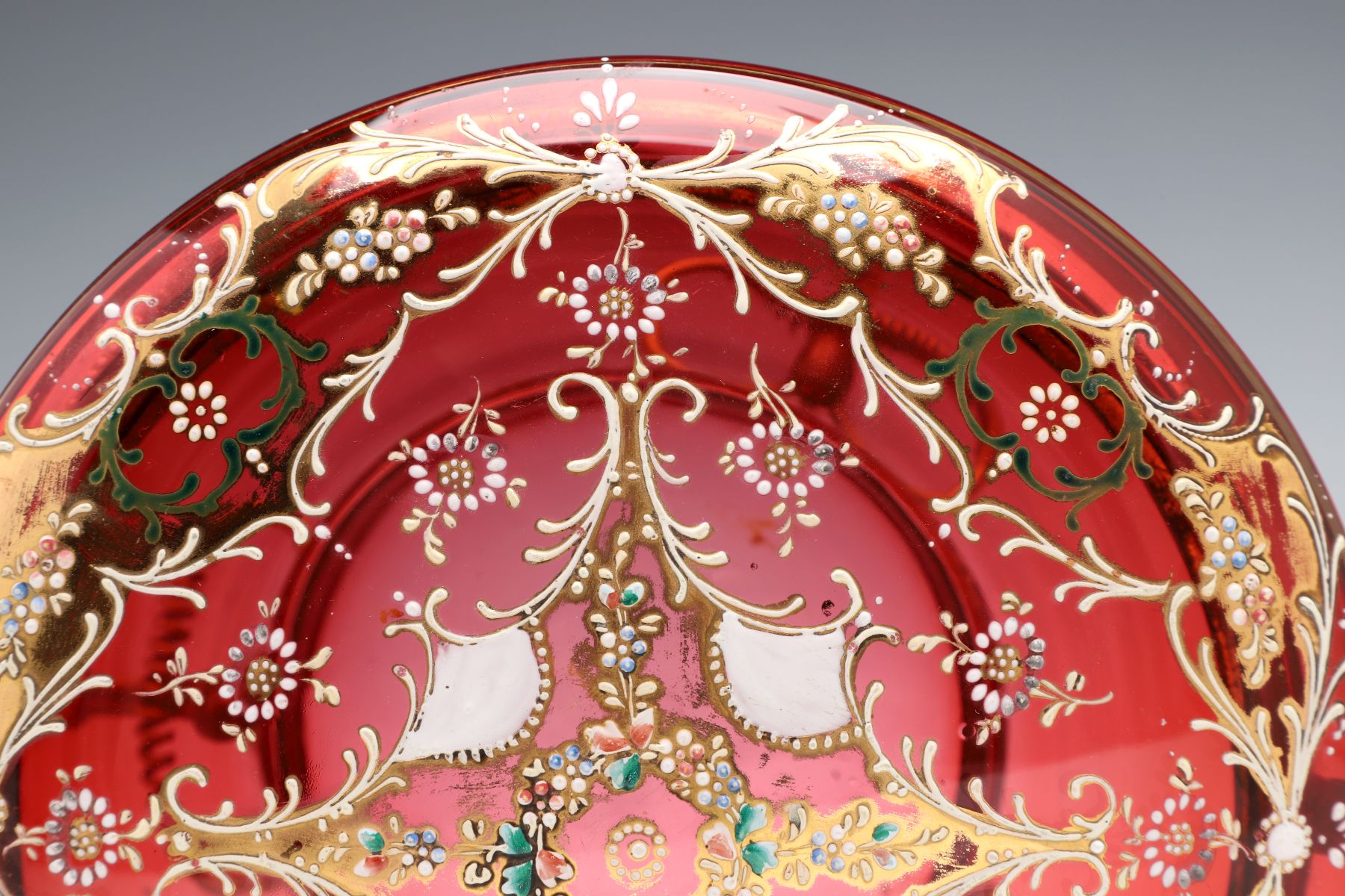 A MOSER GILT AND ENAMEL DECORATED CRANBERRY GLASS BOX