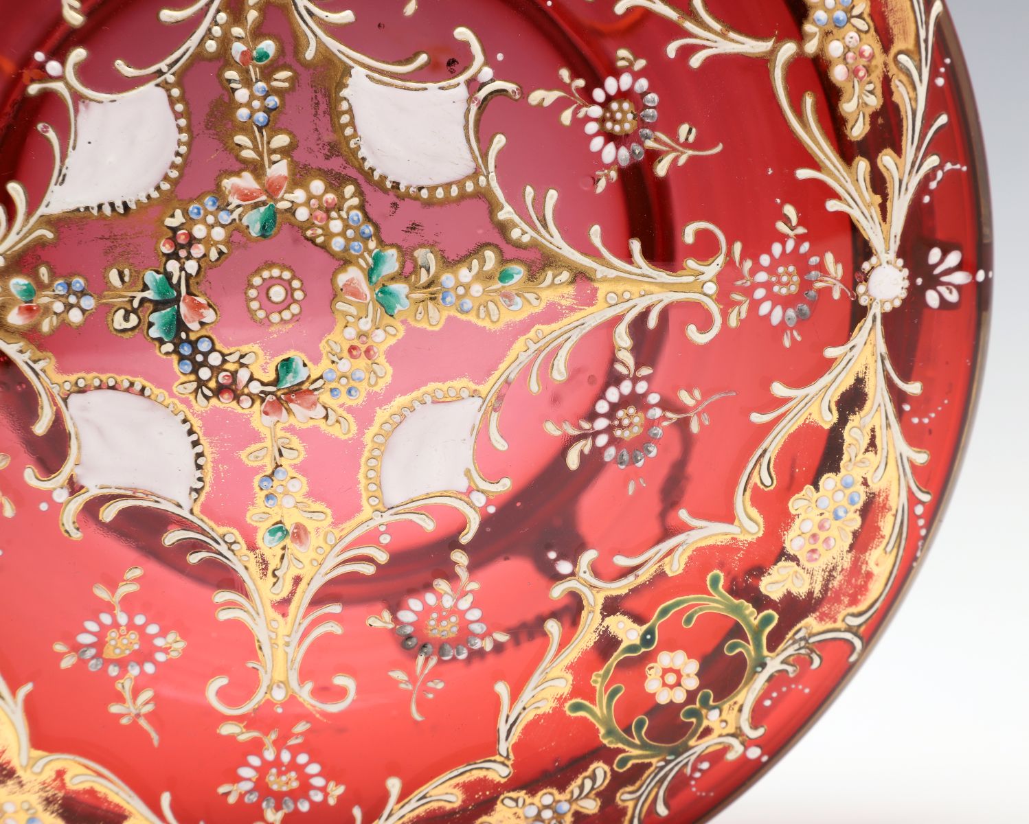 A MOSER GILT AND ENAMEL DECORATED CRANBERRY GLASS BOX