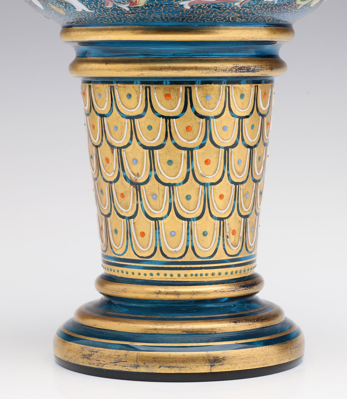 A MOSER BLUE GLASS JUG WITH GILT AND ENAMEL DECORATION