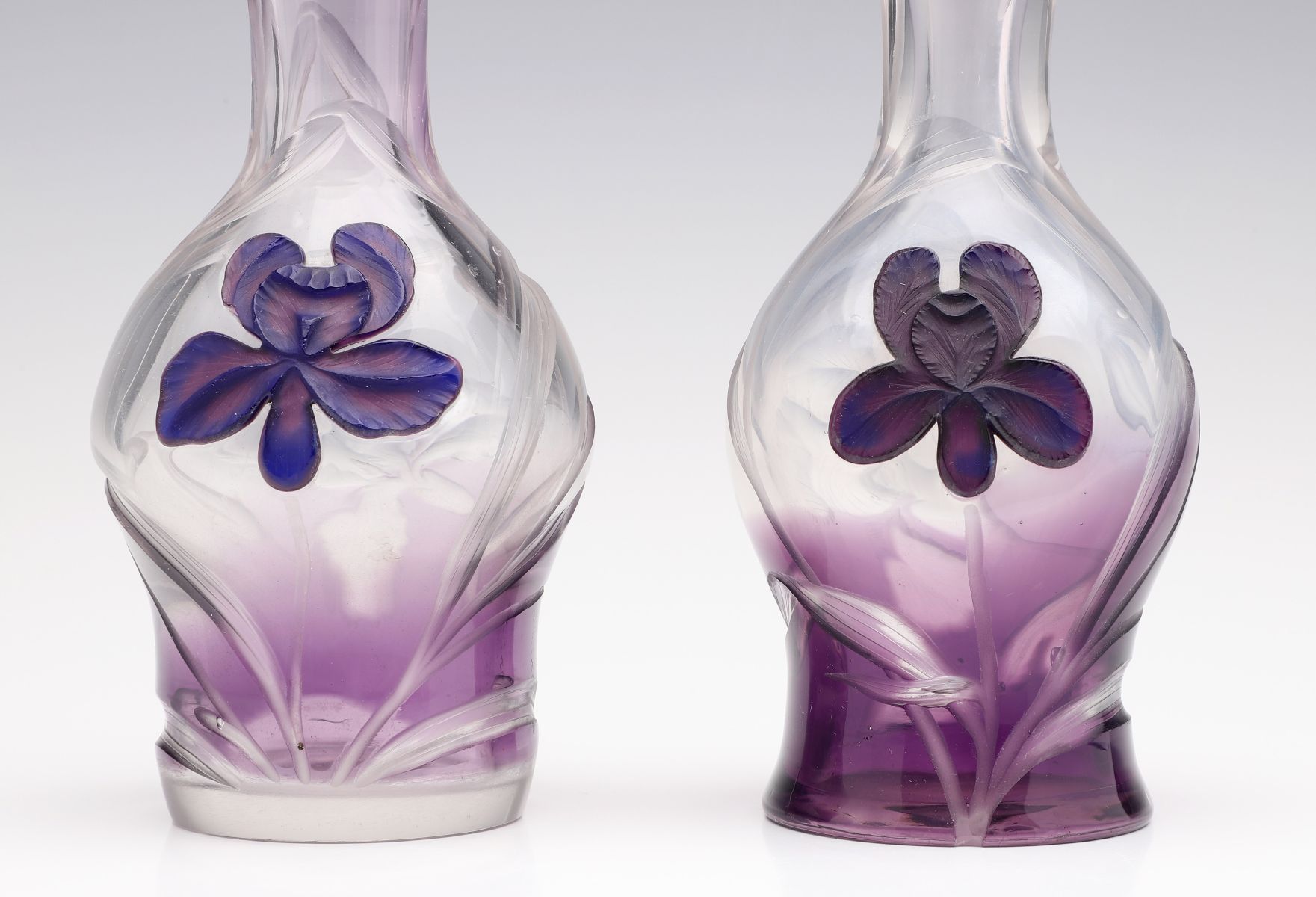 TWO AMETHYST CASED AND CAMEO IRIS VASES SIGNED MOSER