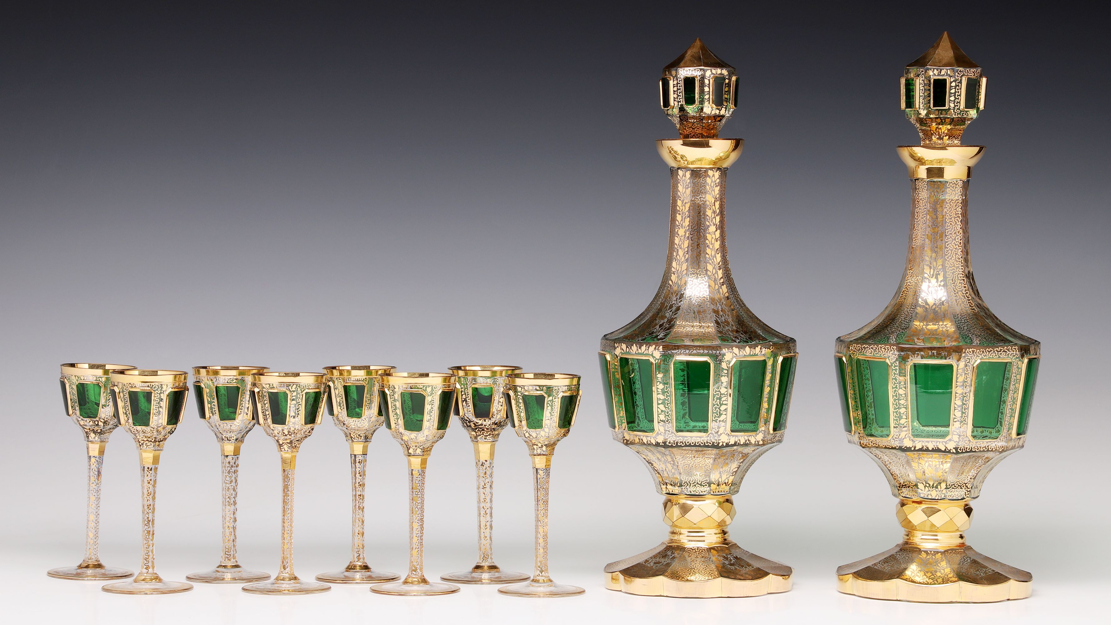 AN OUTSTANDING MOSER EMERALD CABOCHON LIQUER SET