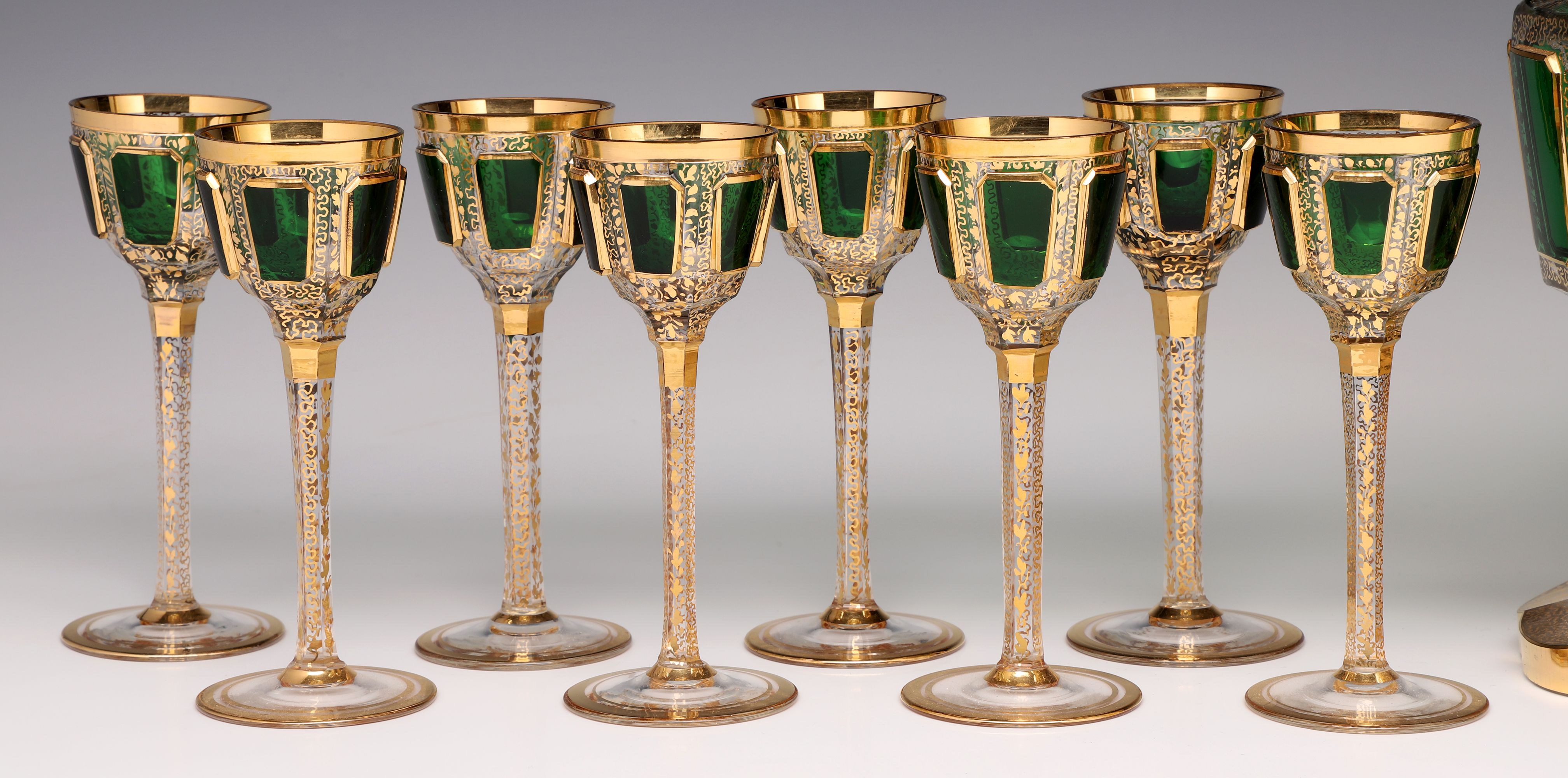 AN OUTSTANDING MOSER EMERALD CABOCHON LIQUER SET