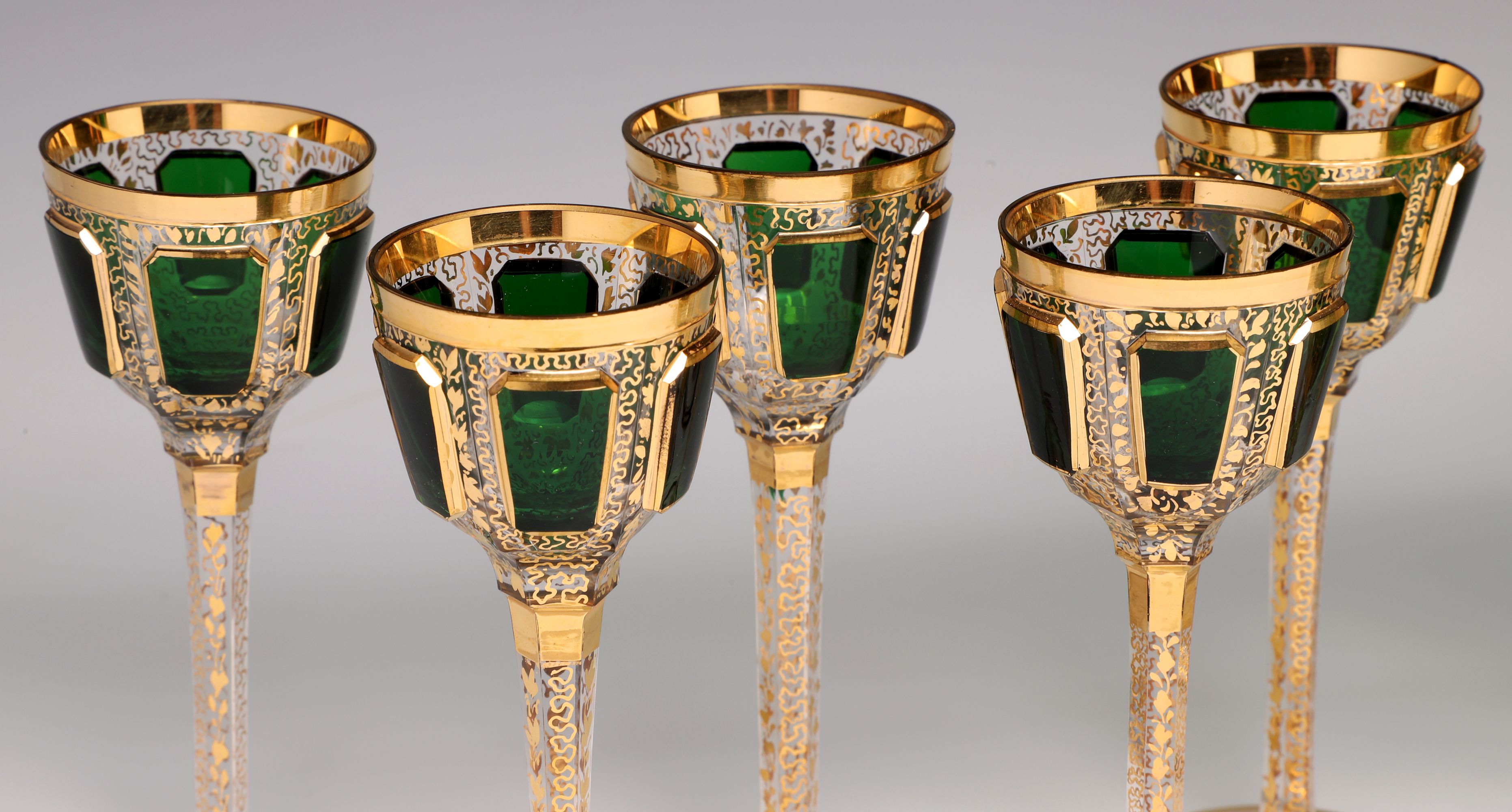 AN OUTSTANDING MOSER EMERALD CABOCHON LIQUER SET