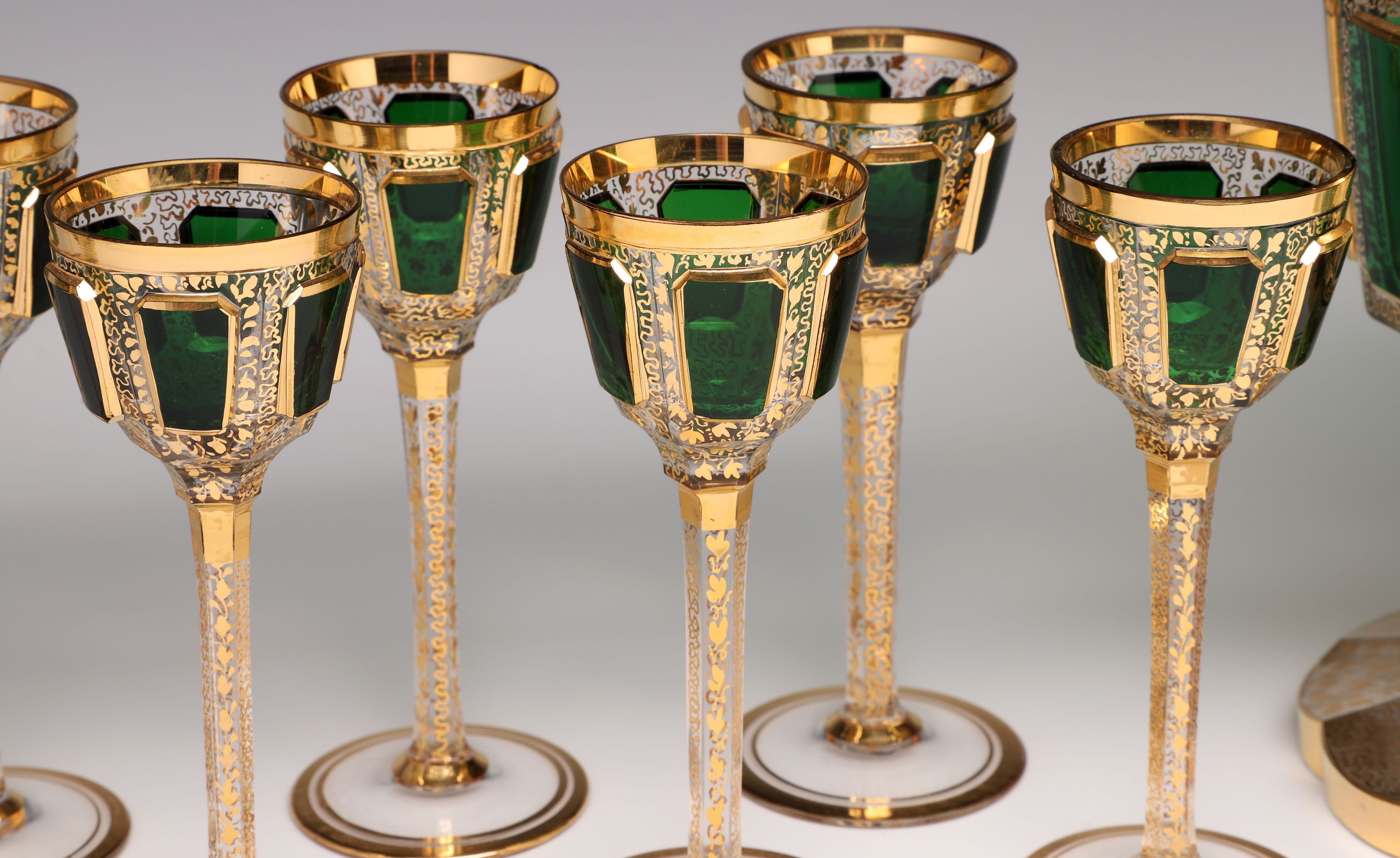 AN OUTSTANDING MOSER EMERALD CABOCHON LIQUER SET