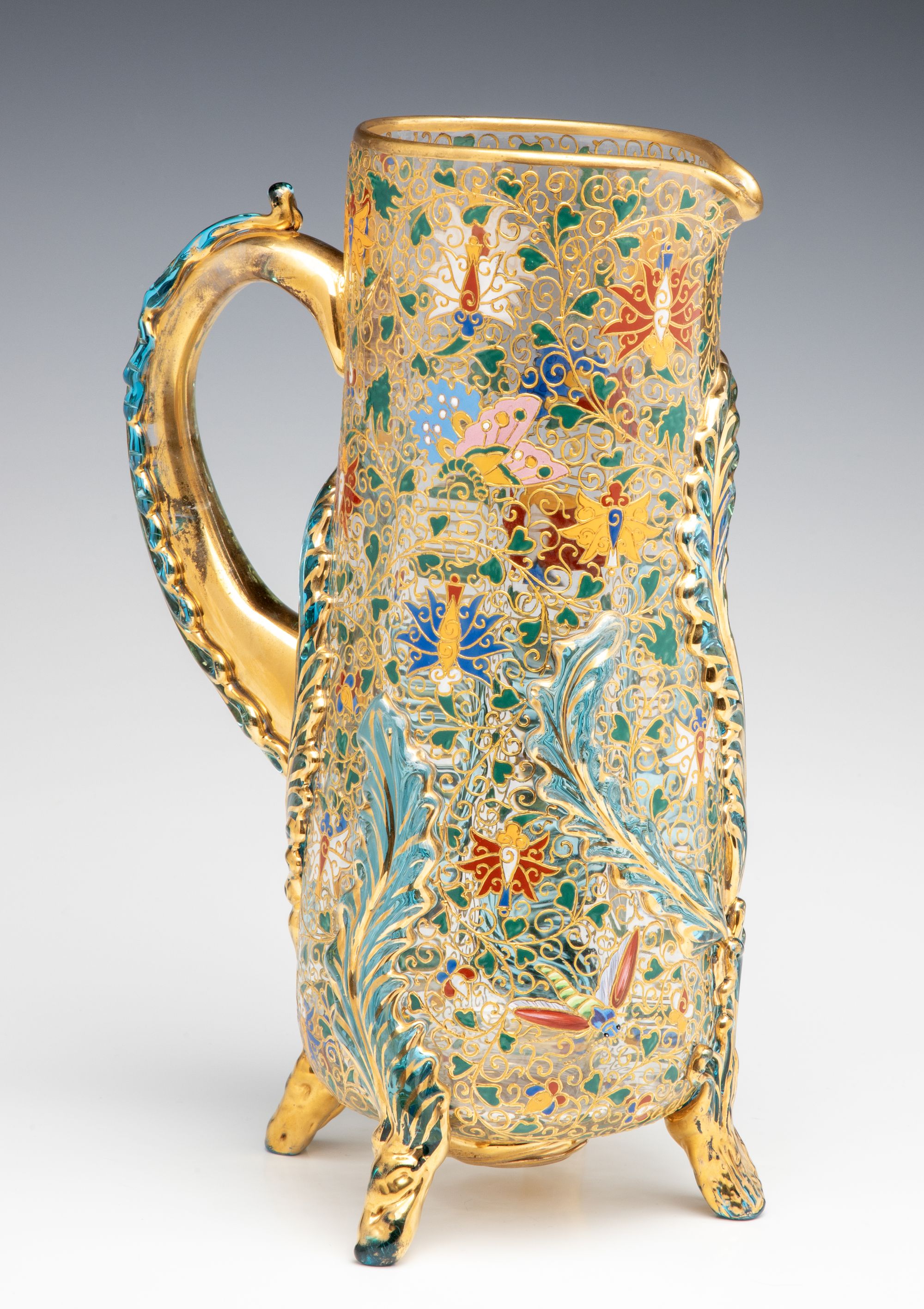 UNUSUAL GILT AND ENAMEL MOSER JUG WITH APPLIED LEAVES