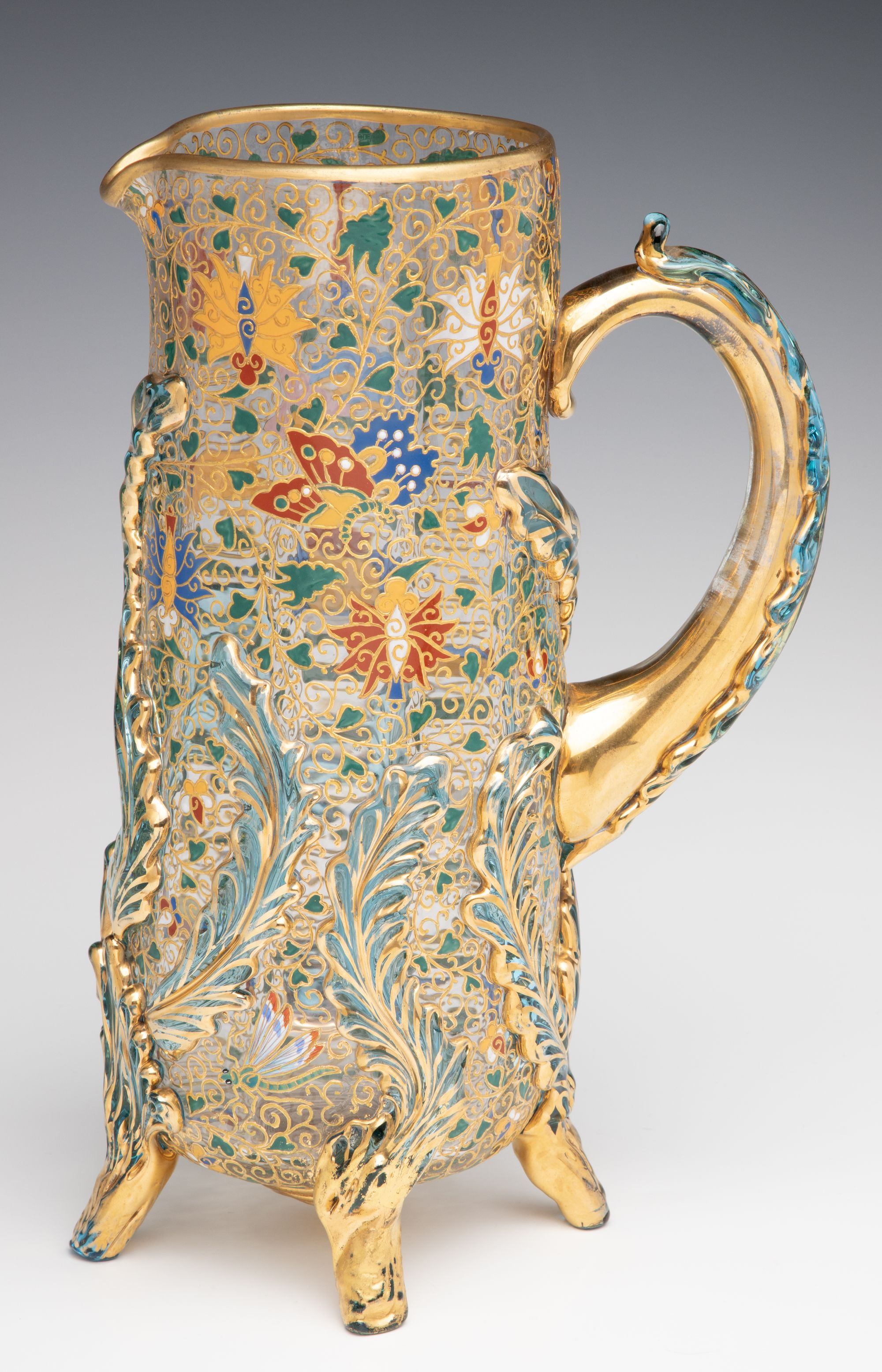 UNUSUAL GILT AND ENAMEL MOSER JUG WITH APPLIED LEAVES