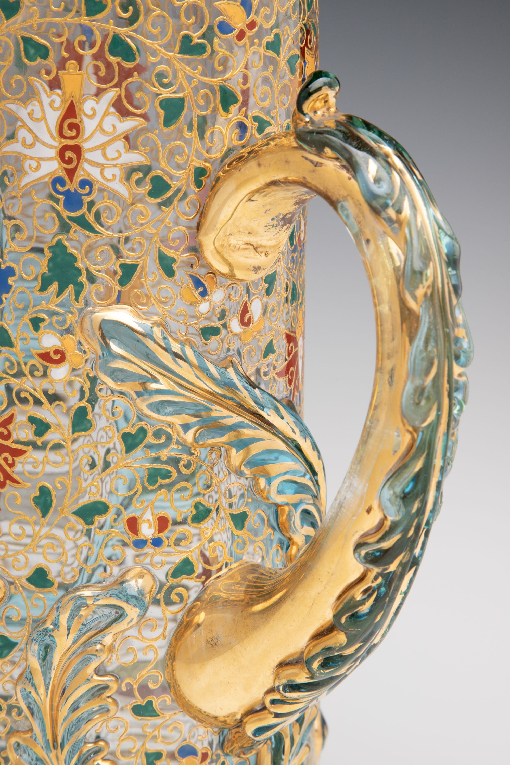 UNUSUAL GILT AND ENAMEL MOSER JUG WITH APPLIED LEAVES