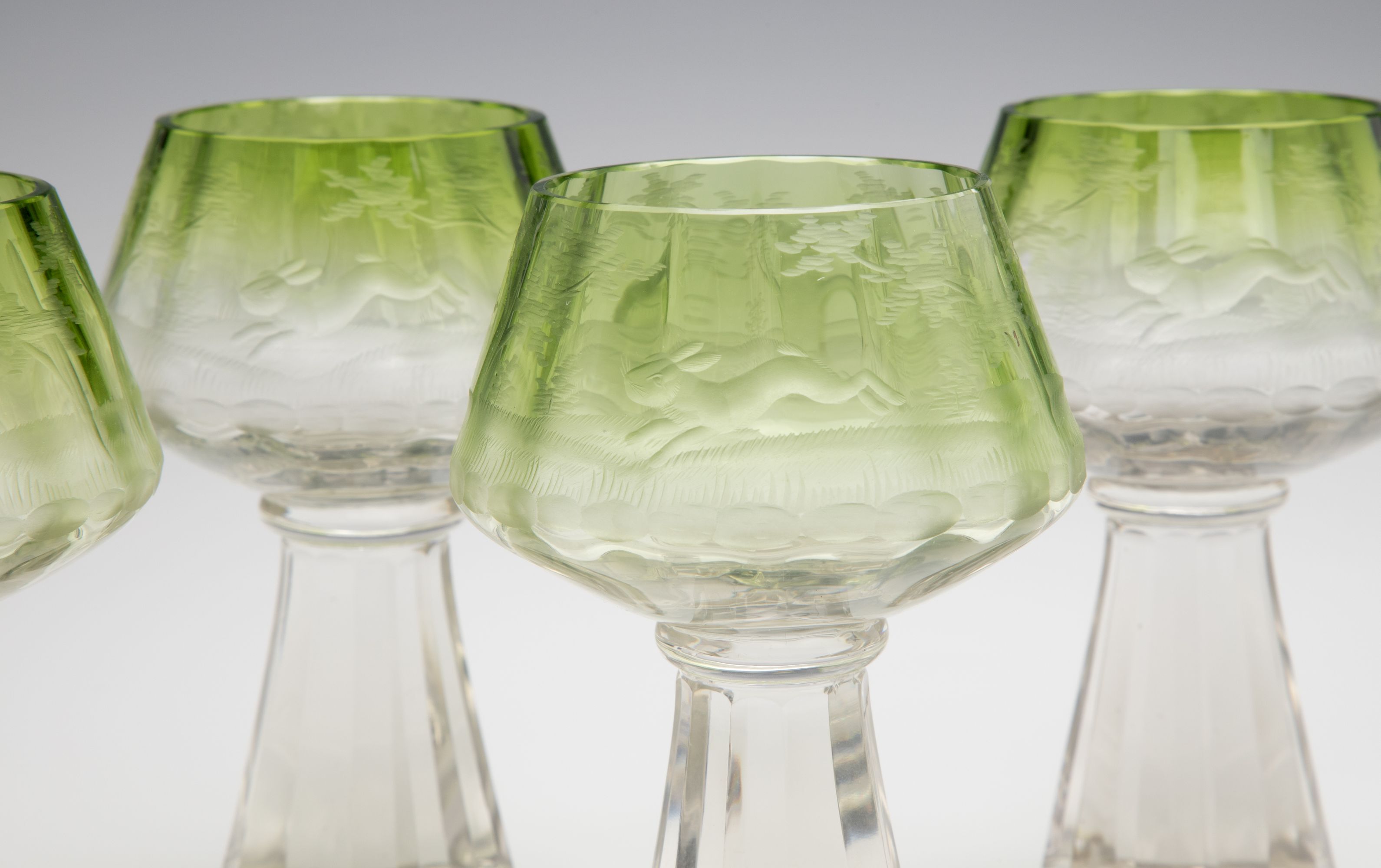 A VERY UNUSUAL BOHEMIAN GLASS PUNCH BOWL WITH GOBLETS