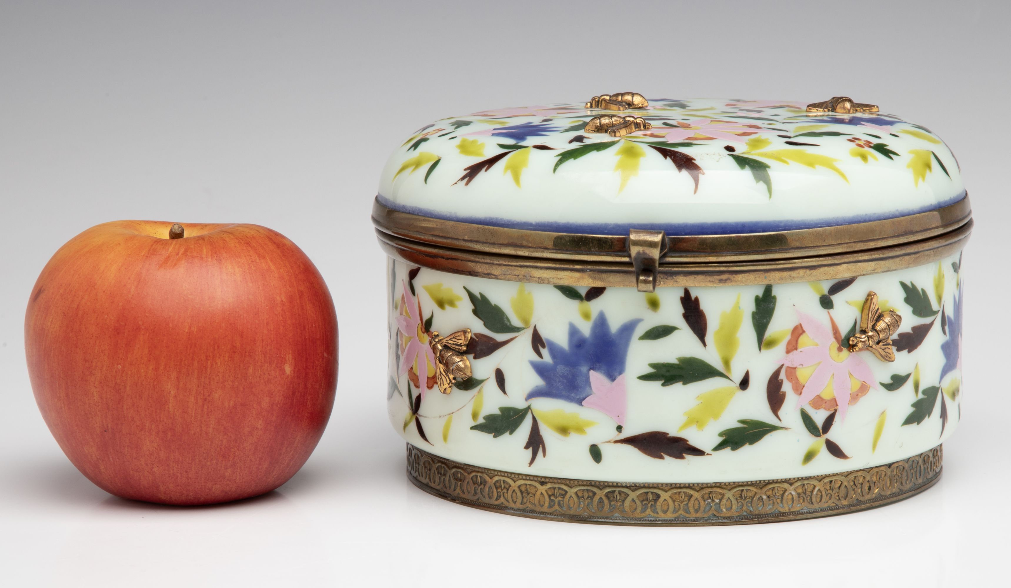 A 19C OPALINE DRESSER BOX WITH GILDED BEE APPLICATIONS