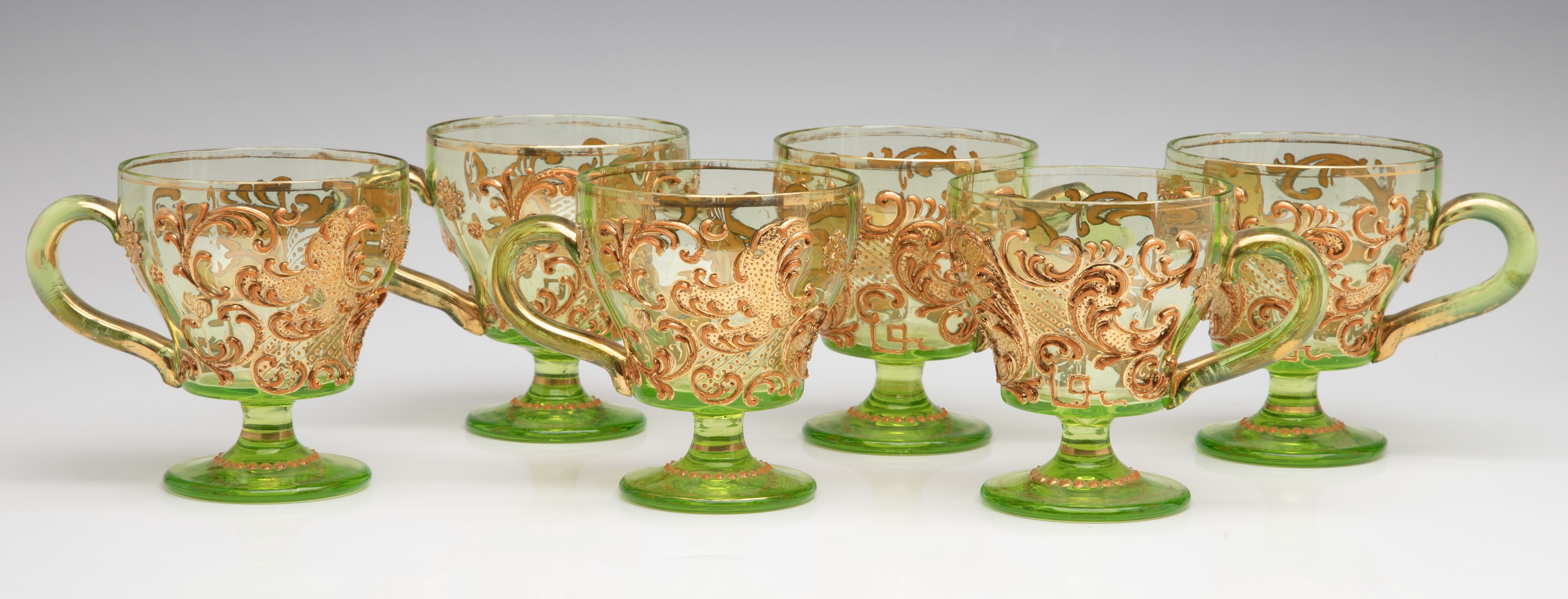 A BOHEMIAN GLASS PUNCH BOWL AND CUPS WITH THICK ENAMELS