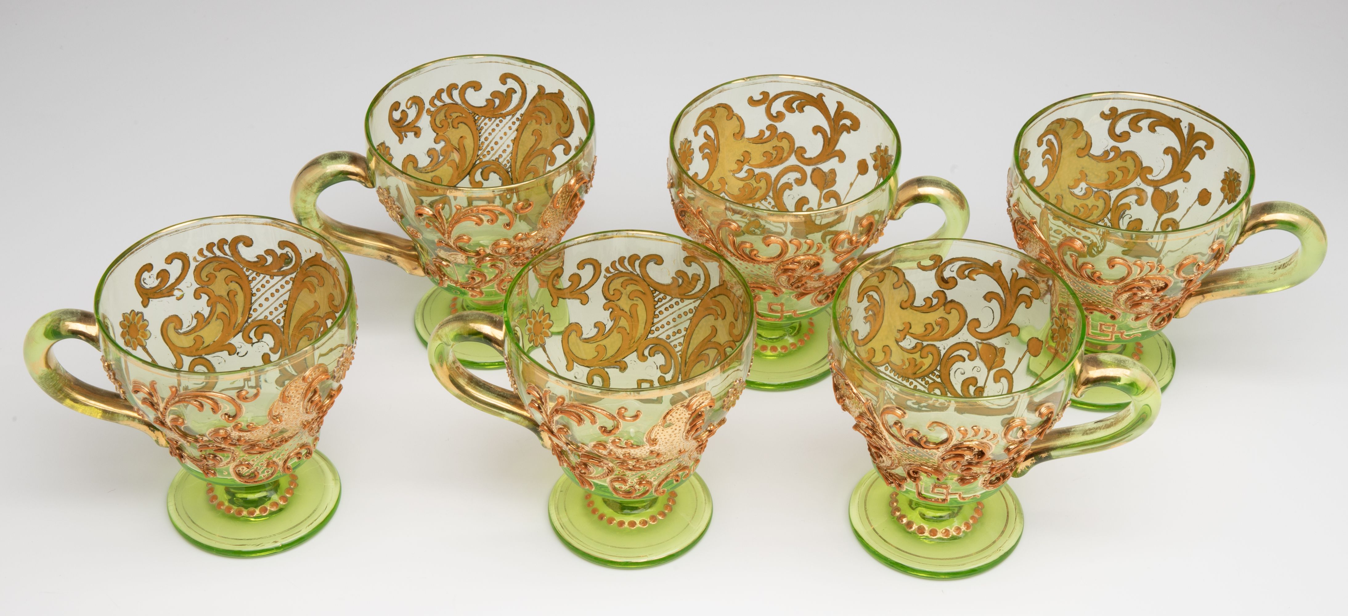 A BOHEMIAN GLASS PUNCH BOWL AND CUPS WITH THICK ENAMELS