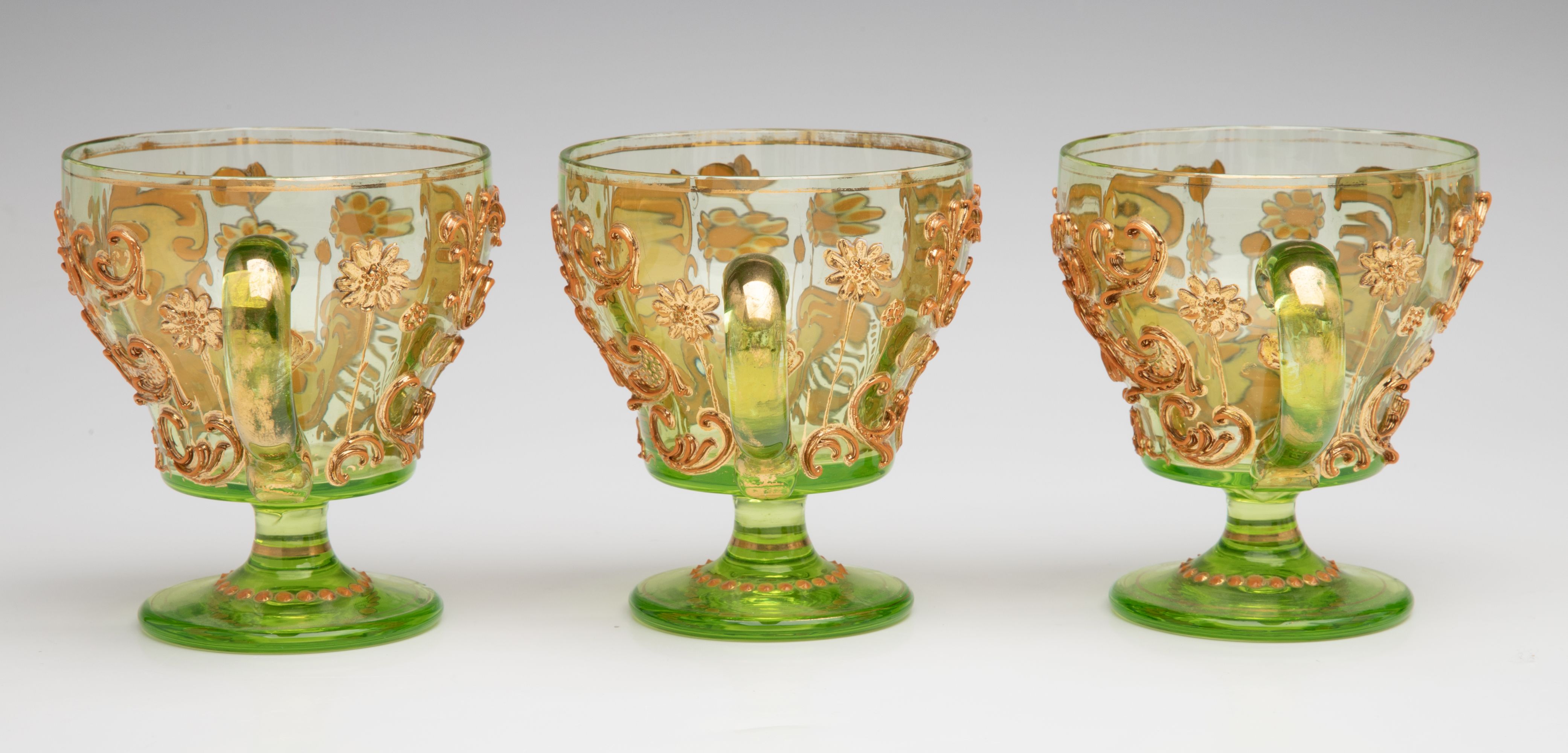 A BOHEMIAN GLASS PUNCH BOWL AND CUPS WITH THICK ENAMELS