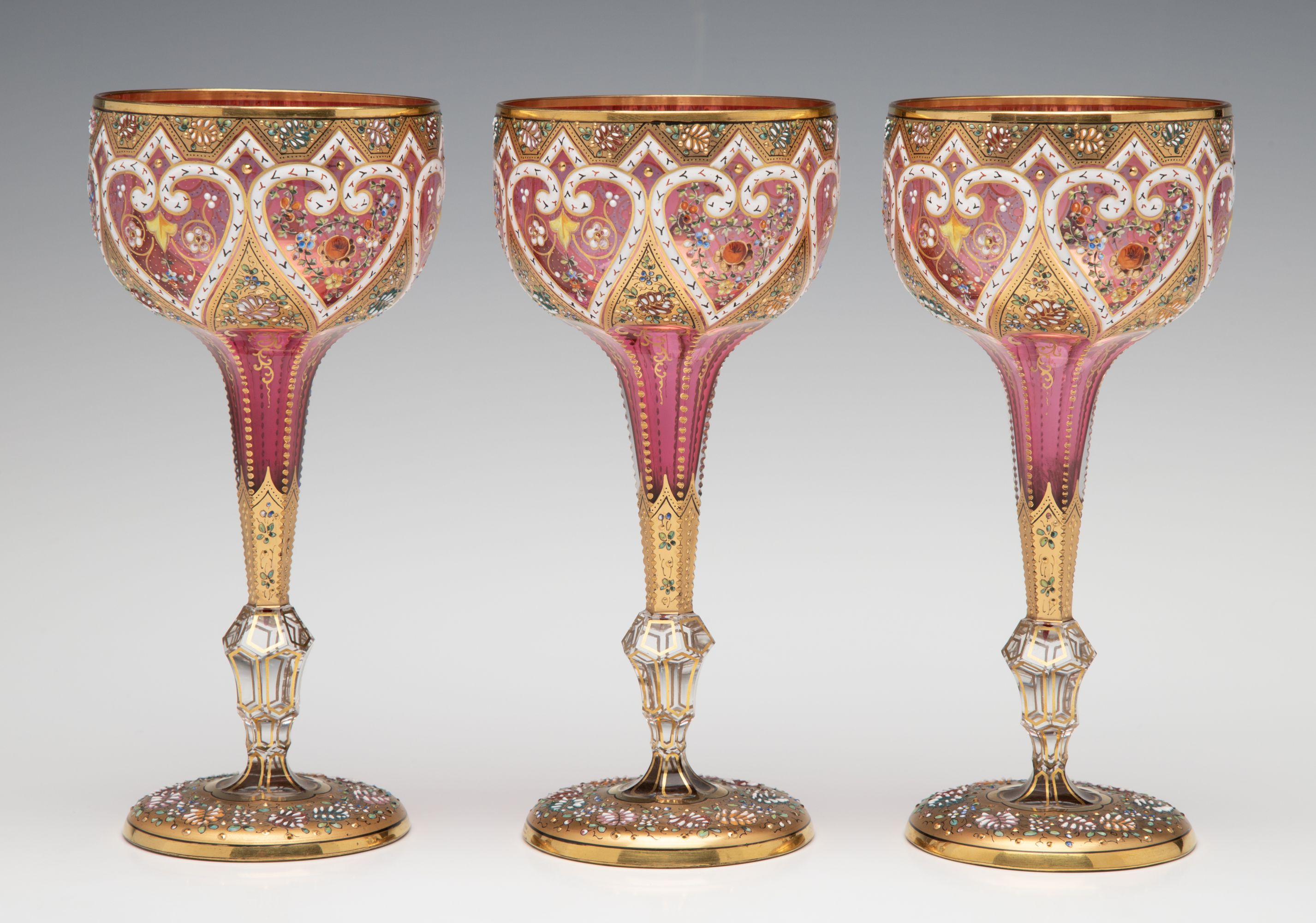 TWELVE ELEGANT GILDED AND ENAMELED MOSER WINE GOBLETS