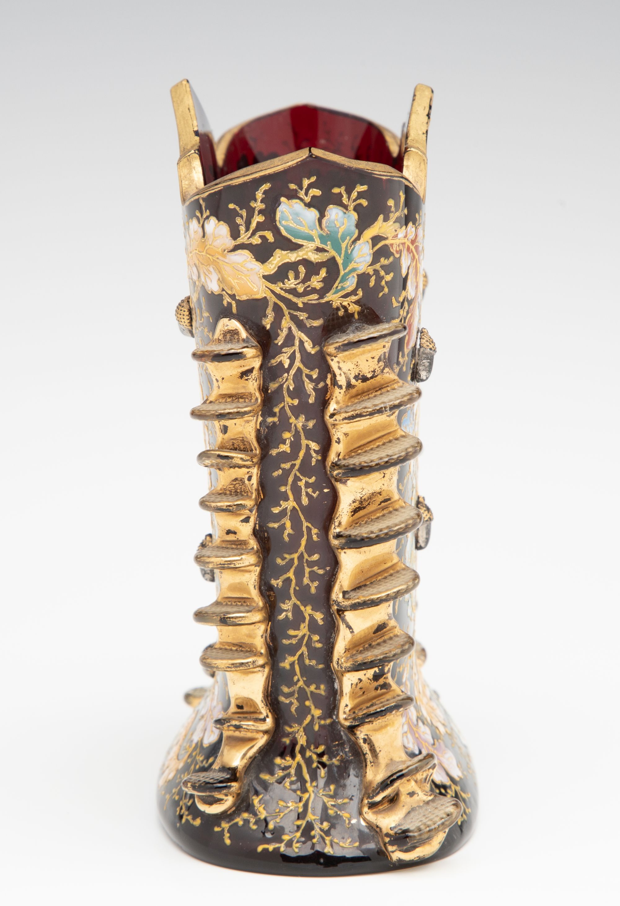 A MOSER DARK RUBY CABINET VASE WITH ACORNS AND RIGAREE