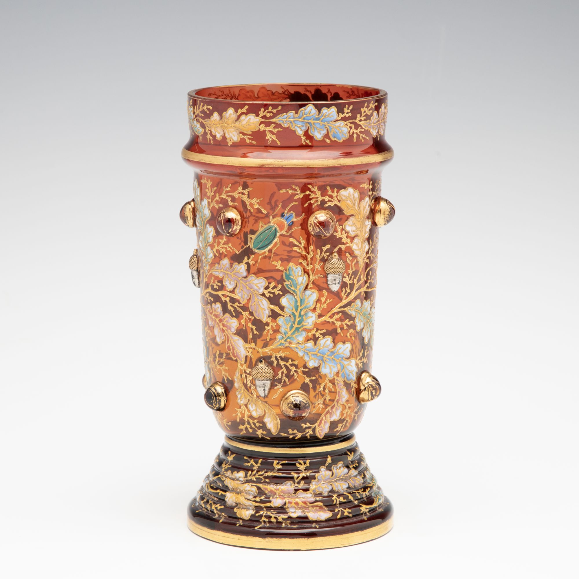 A FINE MOSER AMBERINA VASE WITH ACORNS AND CABOCHONS