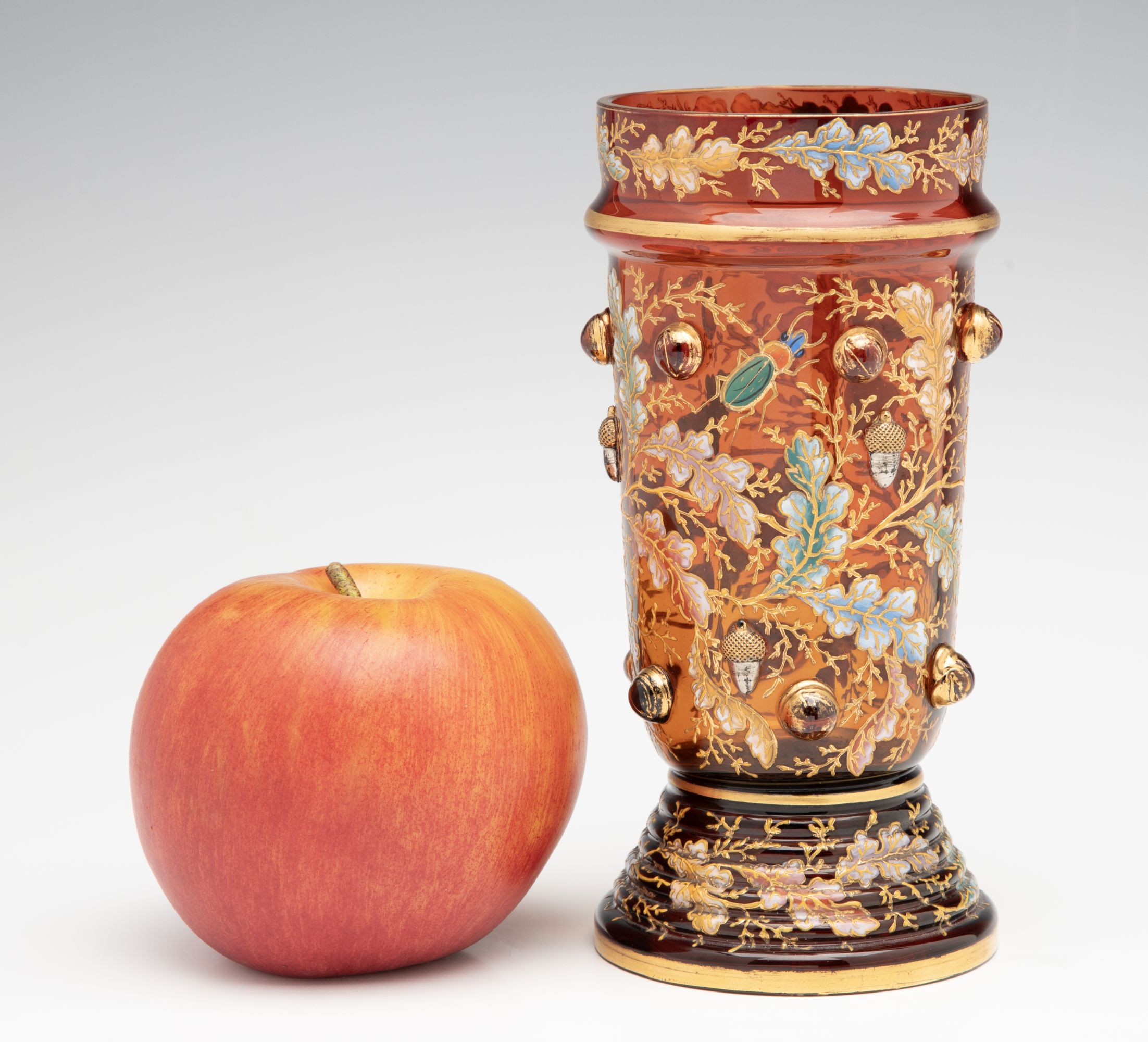 A FINE MOSER AMBERINA VASE WITH ACORNS AND CABOCHONS