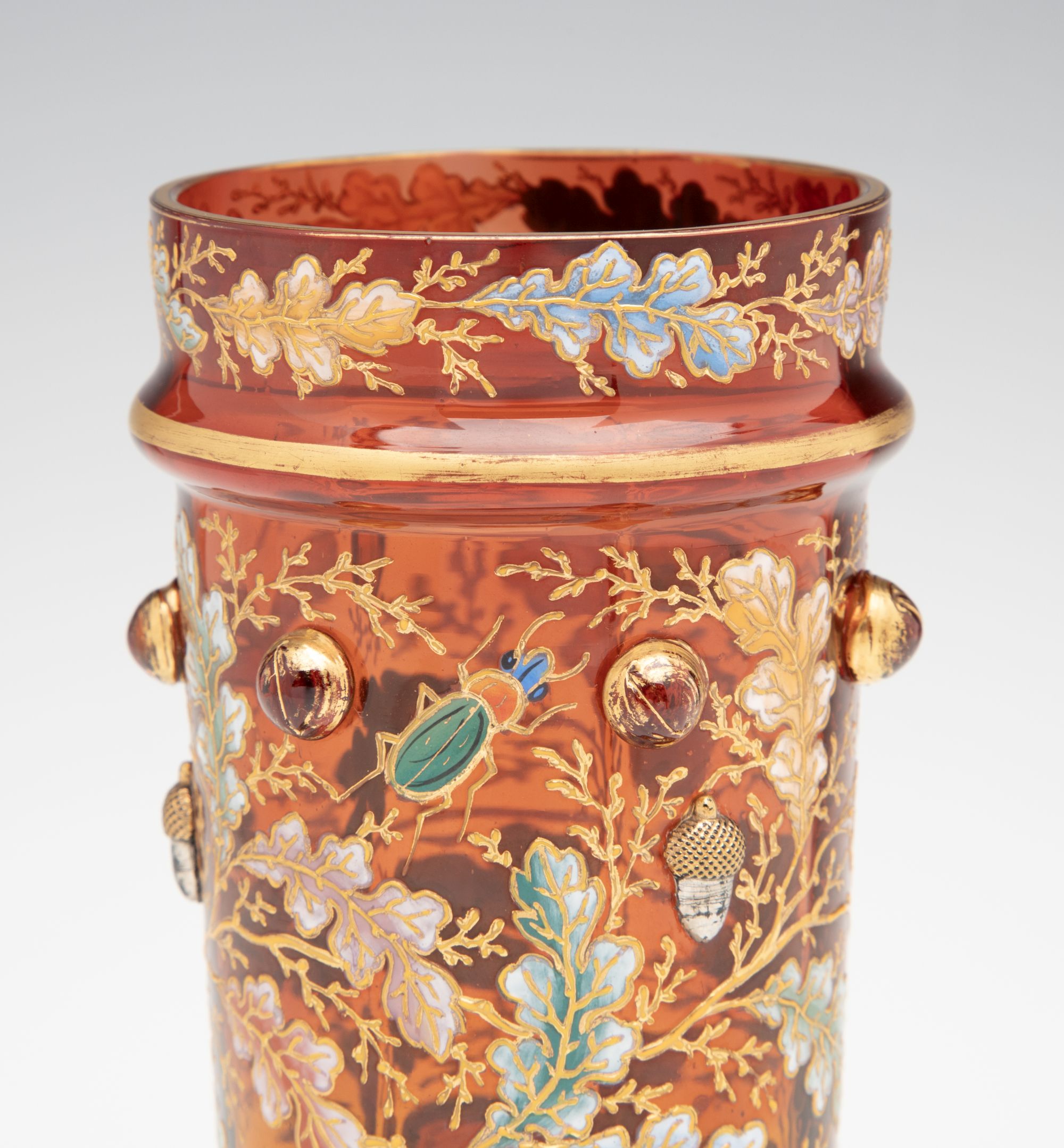 A FINE MOSER AMBERINA VASE WITH ACORNS AND CABOCHONS