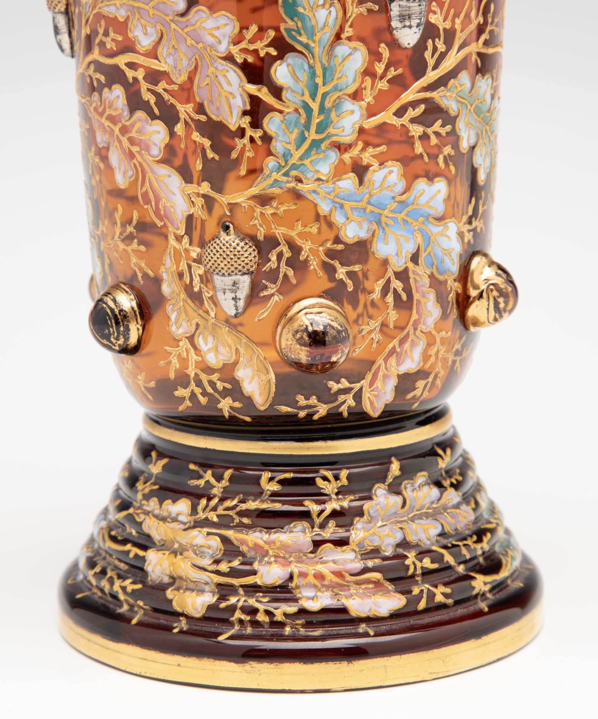 A FINE MOSER AMBERINA VASE WITH ACORNS AND CABOCHONS