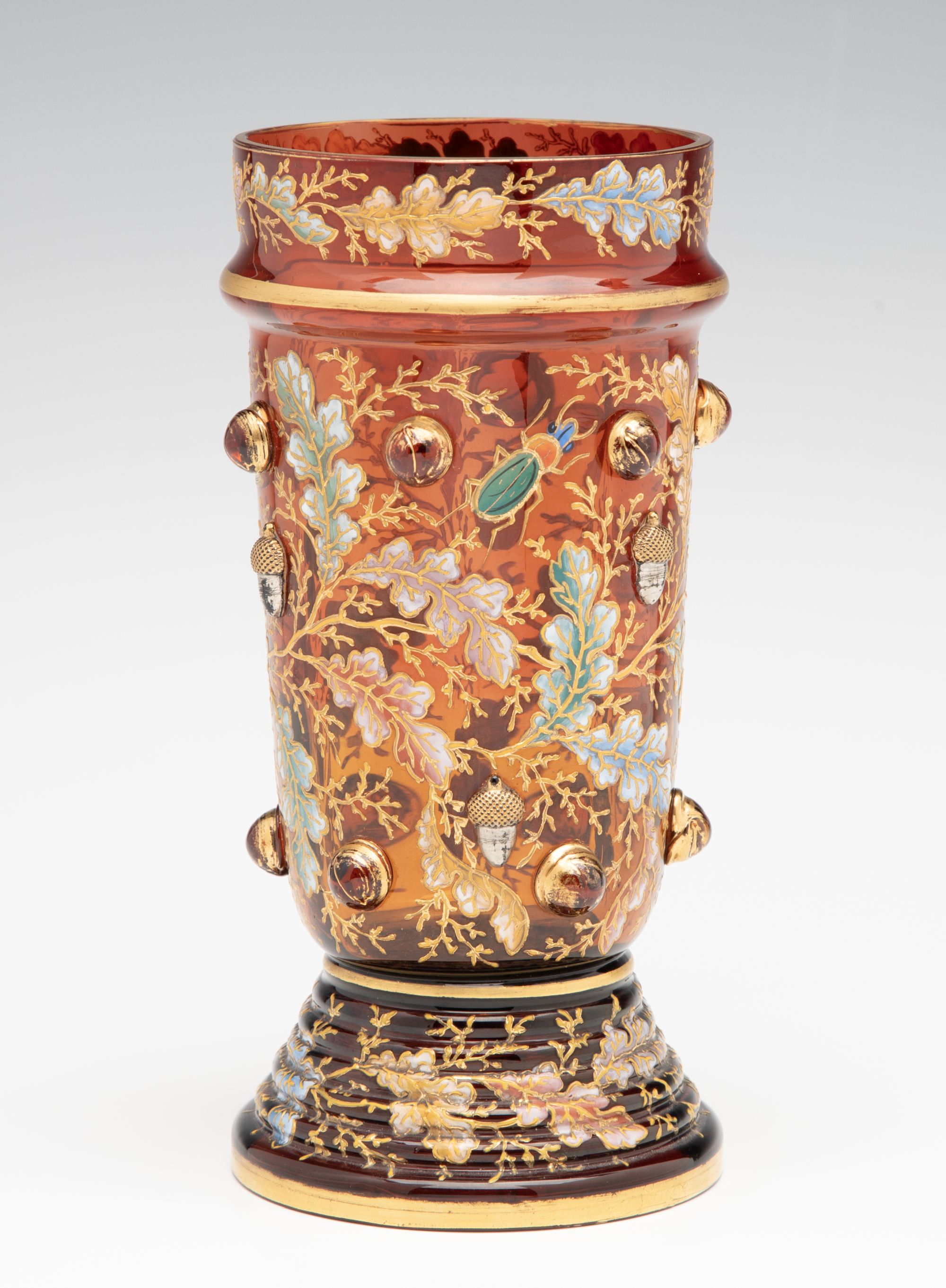 A FINE MOSER AMBERINA VASE WITH ACORNS AND CABOCHONS