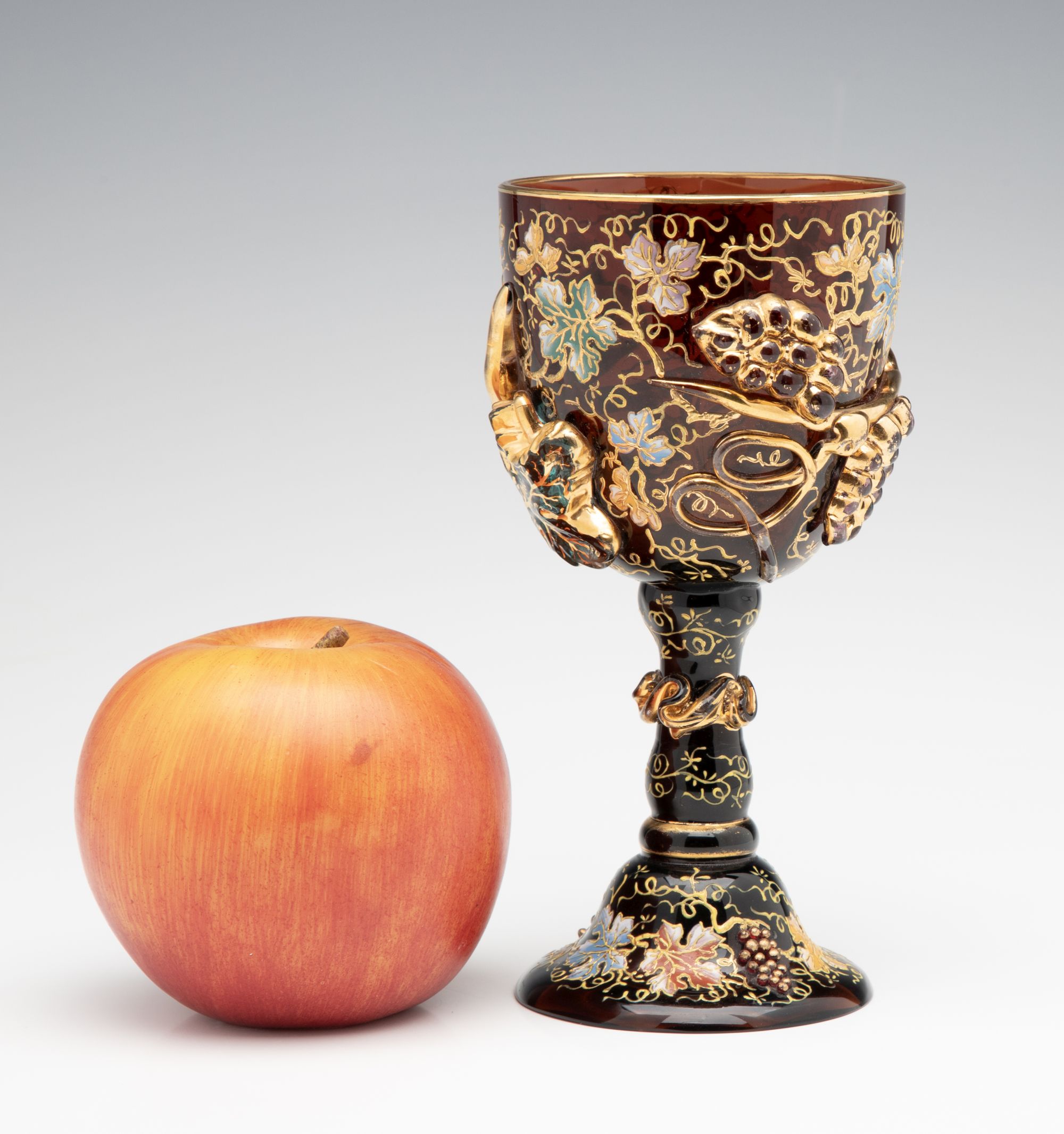 A MOSER DARK AMBERINA GOBLET WITH THICK APPLICATIONS