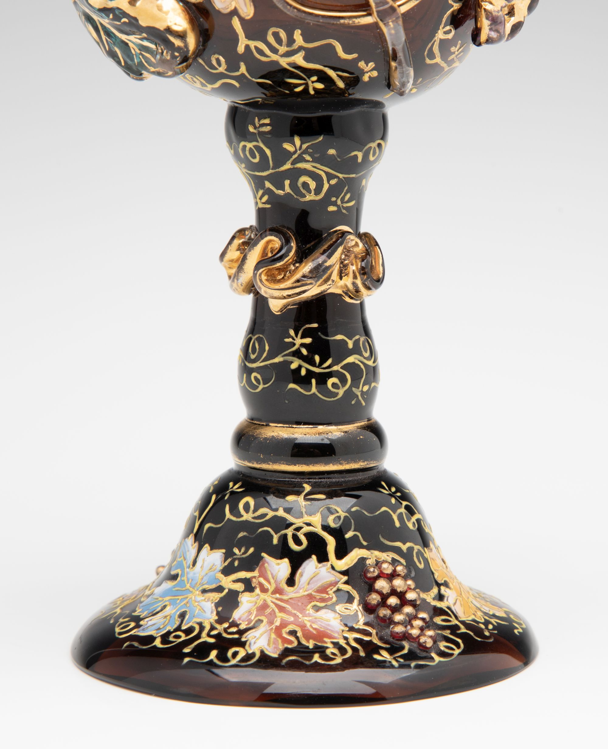 A MOSER DARK AMBERINA GOBLET WITH THICK APPLICATIONS