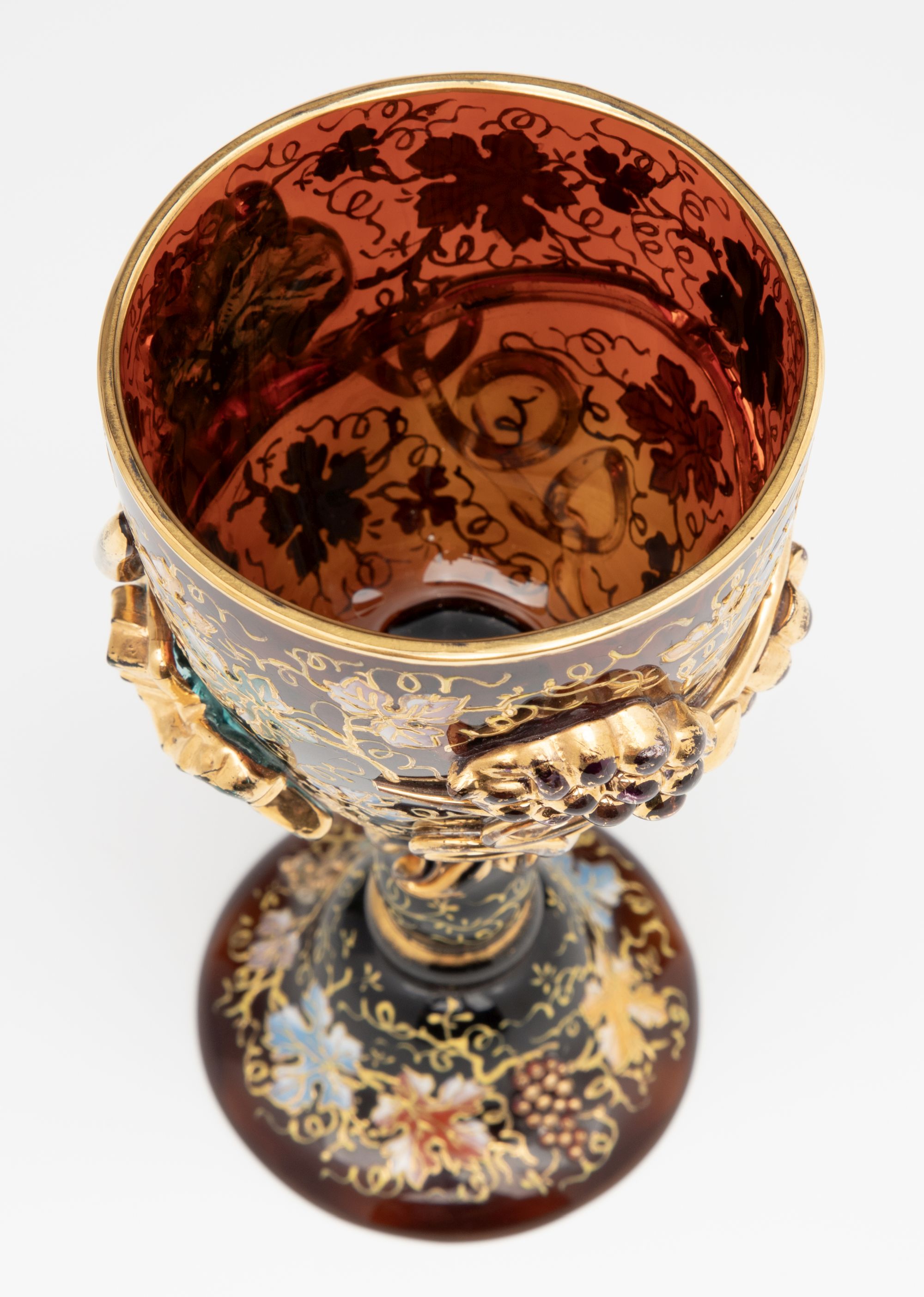 A MOSER DARK AMBERINA GOBLET WITH THICK APPLICATIONS