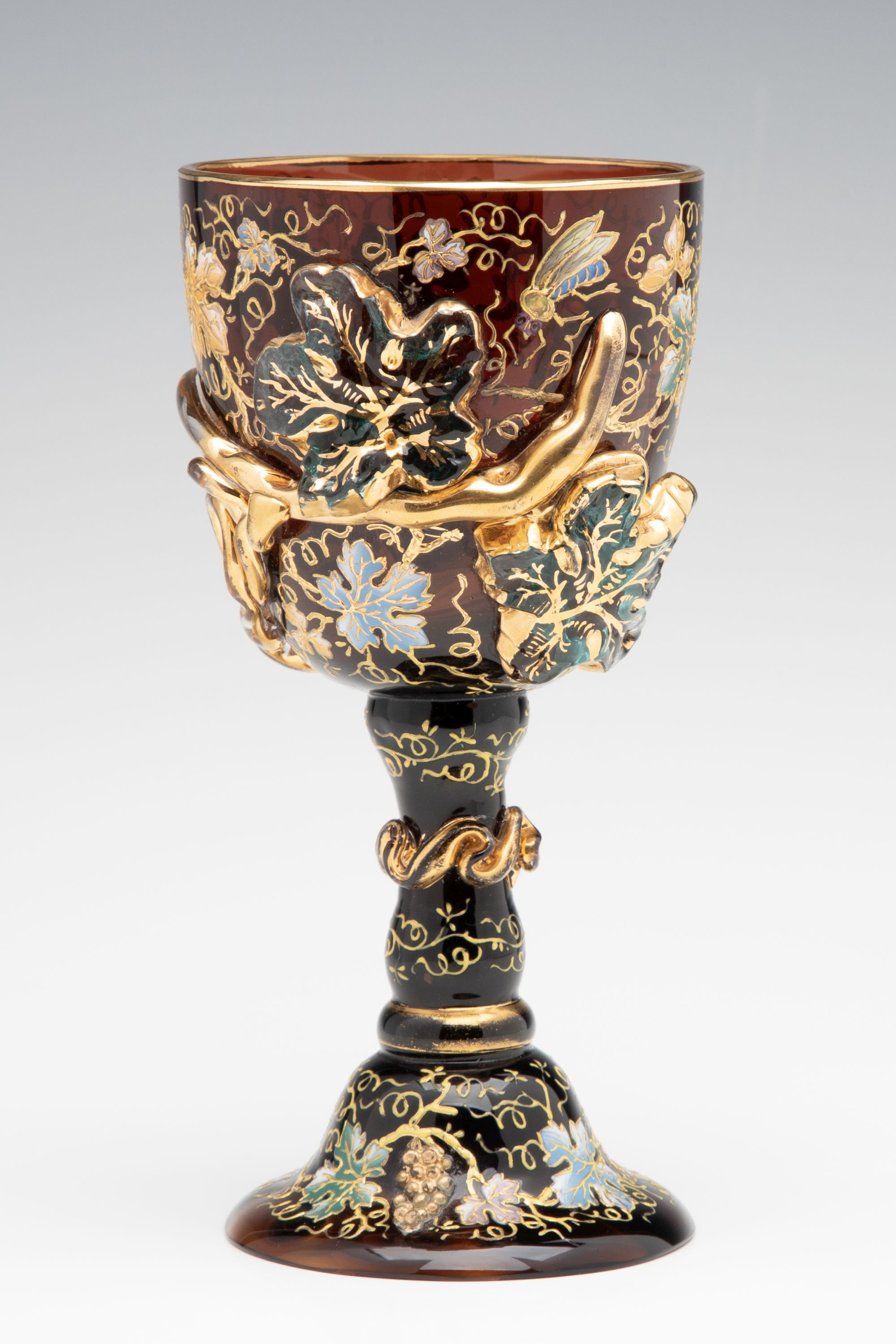 A MOSER DARK AMBERINA GOBLET WITH THICK APPLICATIONS