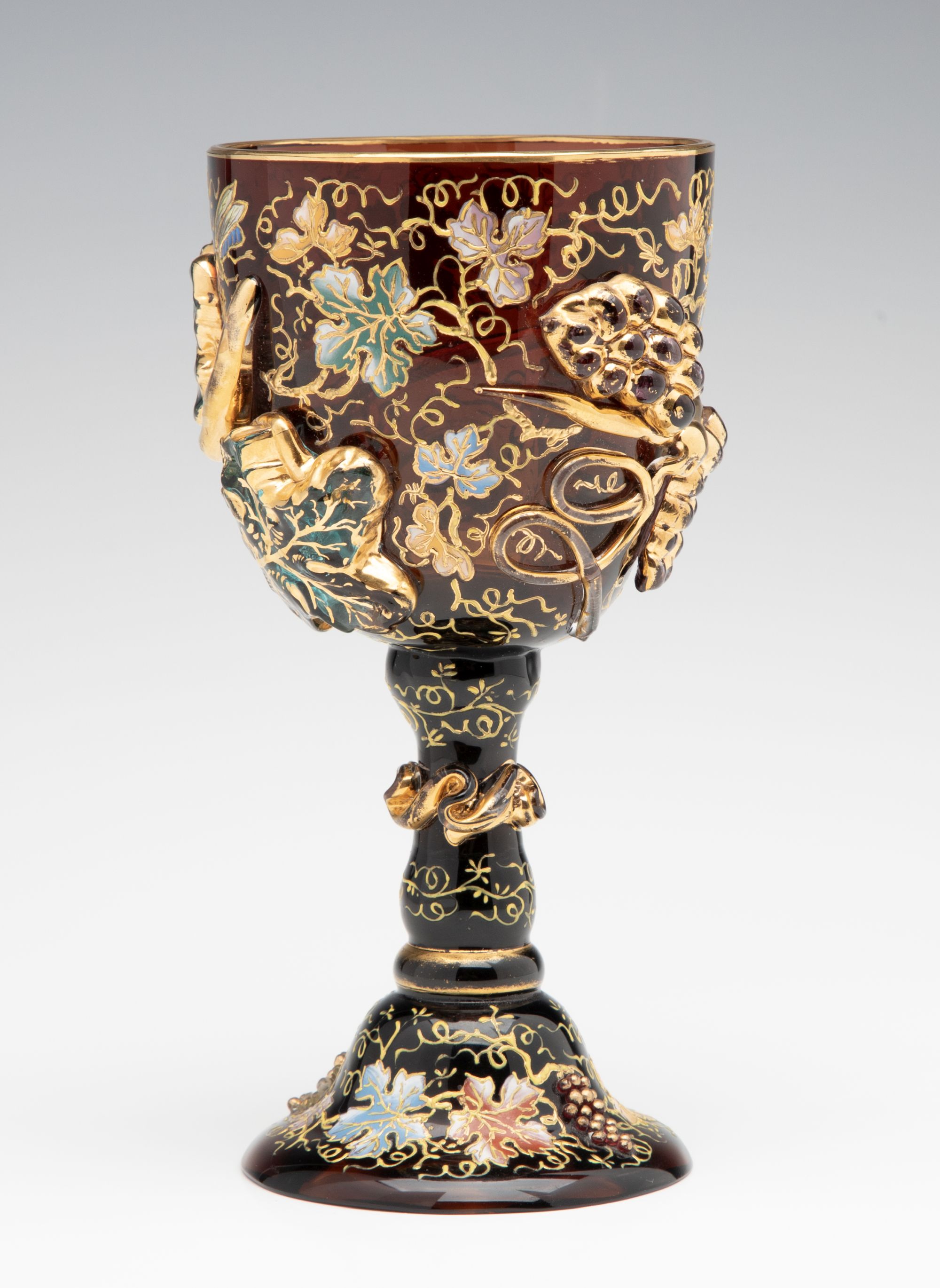 A MOSER DARK AMBERINA GOBLET WITH THICK APPLICATIONS