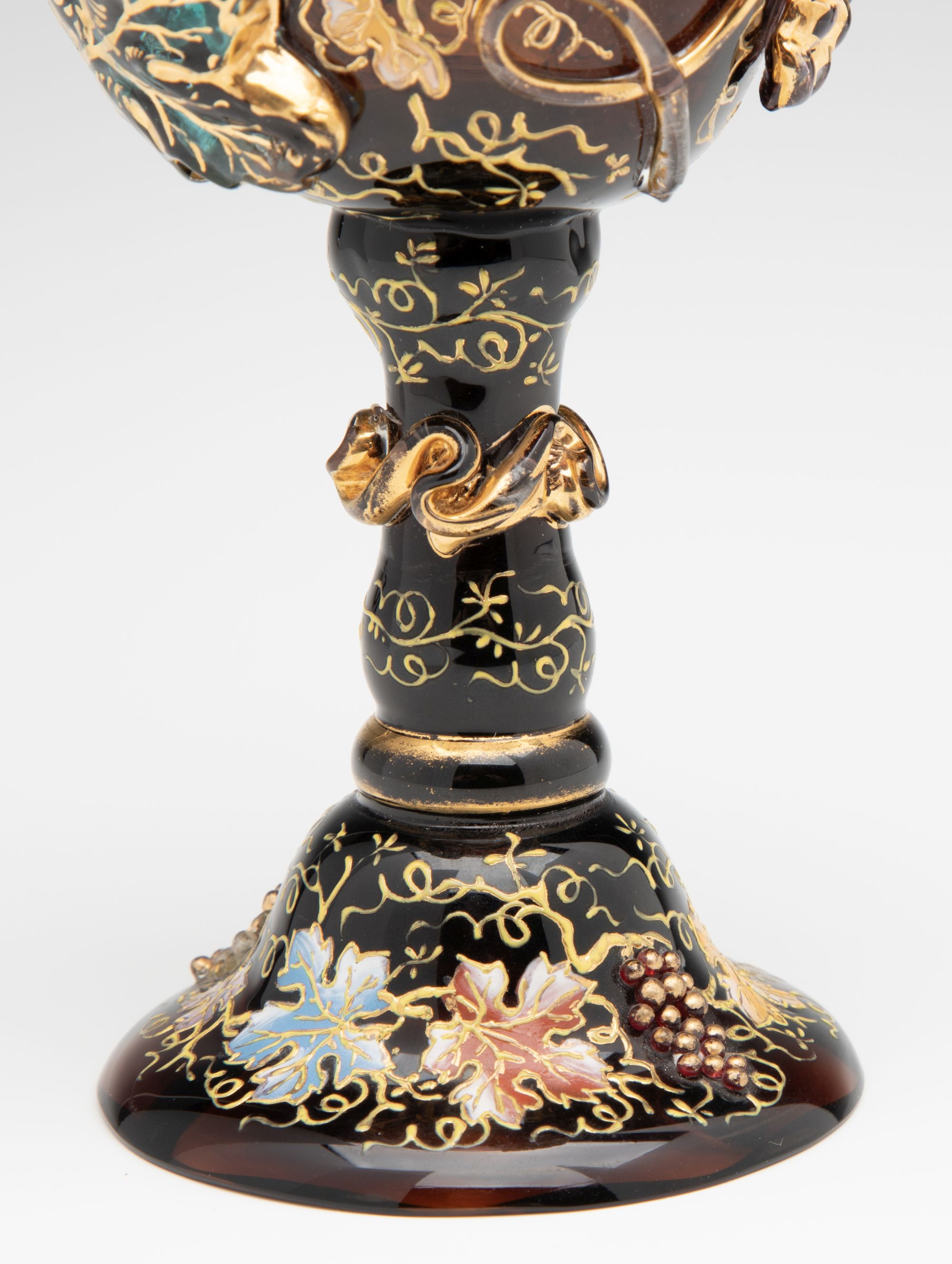 A MOSER DARK AMBERINA GOBLET WITH THICK APPLICATIONS