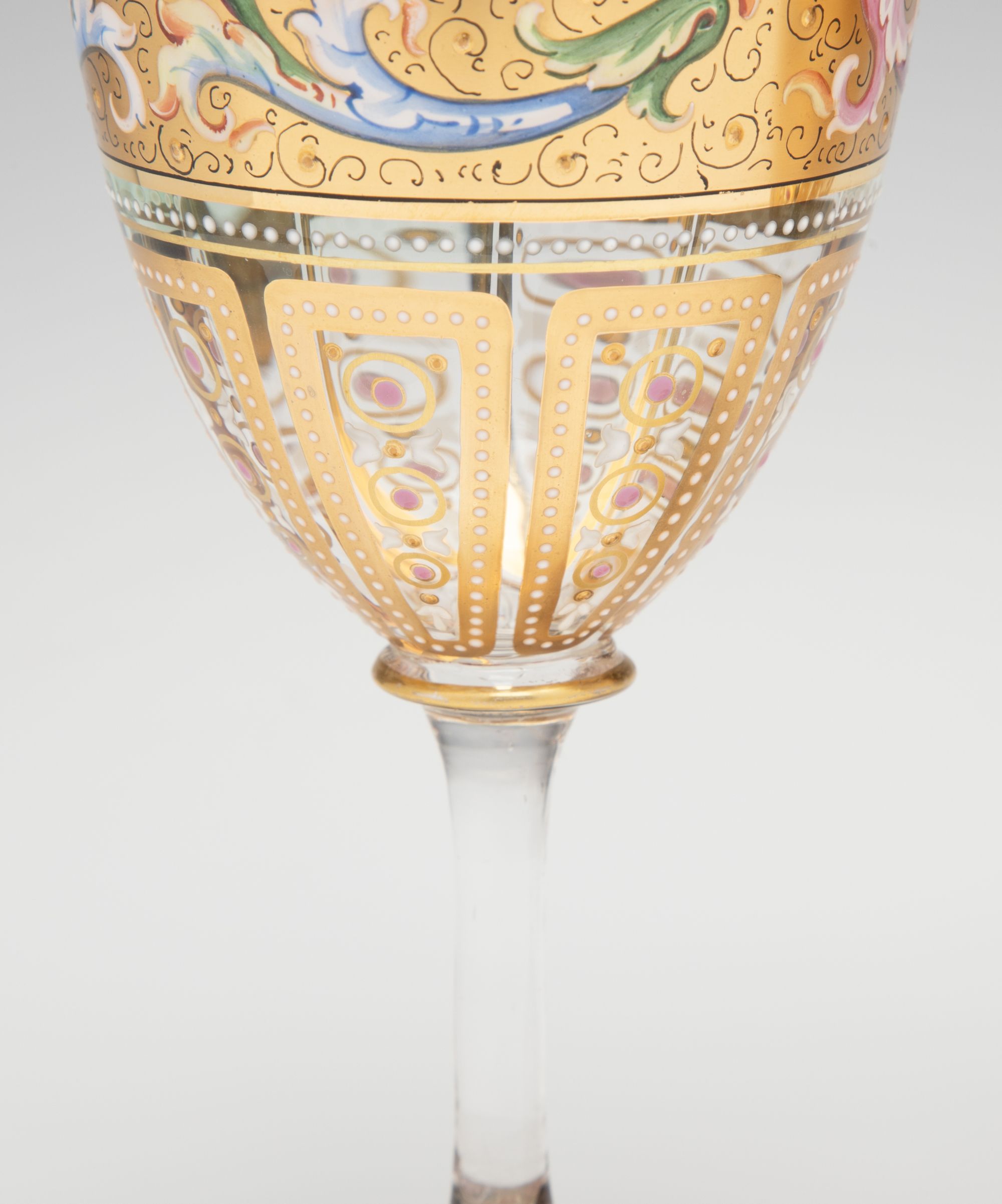 A FINE PAIR OF MOSER GILT AND ENAMEL DECORATED GOBLETS