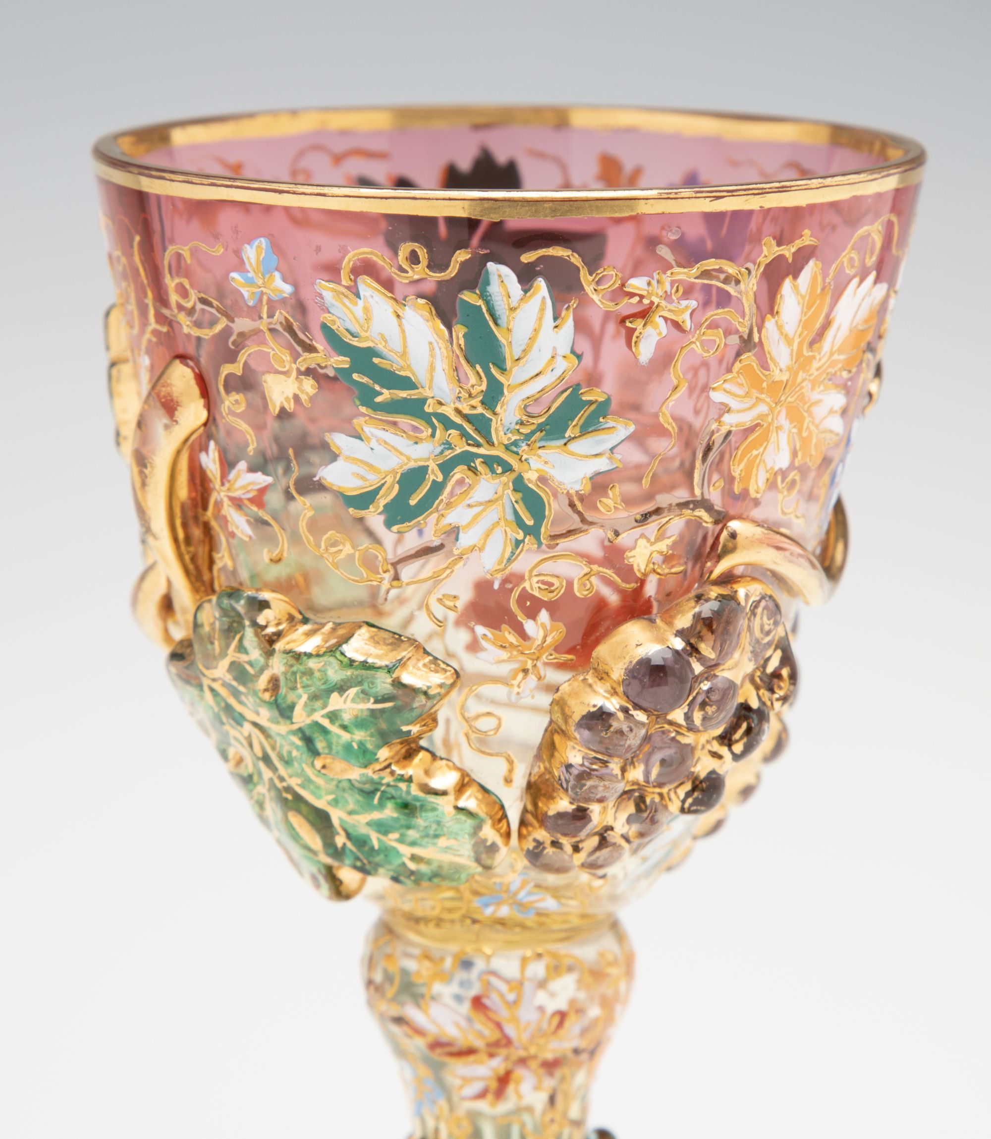 A MOSER SHADED PINK GOBLET WITH THICK APPLICATIONS